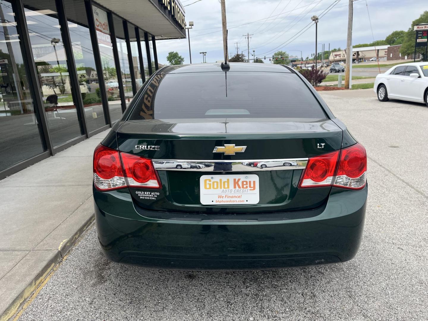 2015 Rainforest Green Metallic Chevrolet Cruze 1LT Auto (1G1PC5SB6F7) with an 1.4L L4 DOHC 16V TURBO engine, 6-Speed Automatic transmission, located at 1633 W Kimberly, Davenport, IA, 52806, (563) 323-5341, 41.559456, -90.598732 - Photo#4