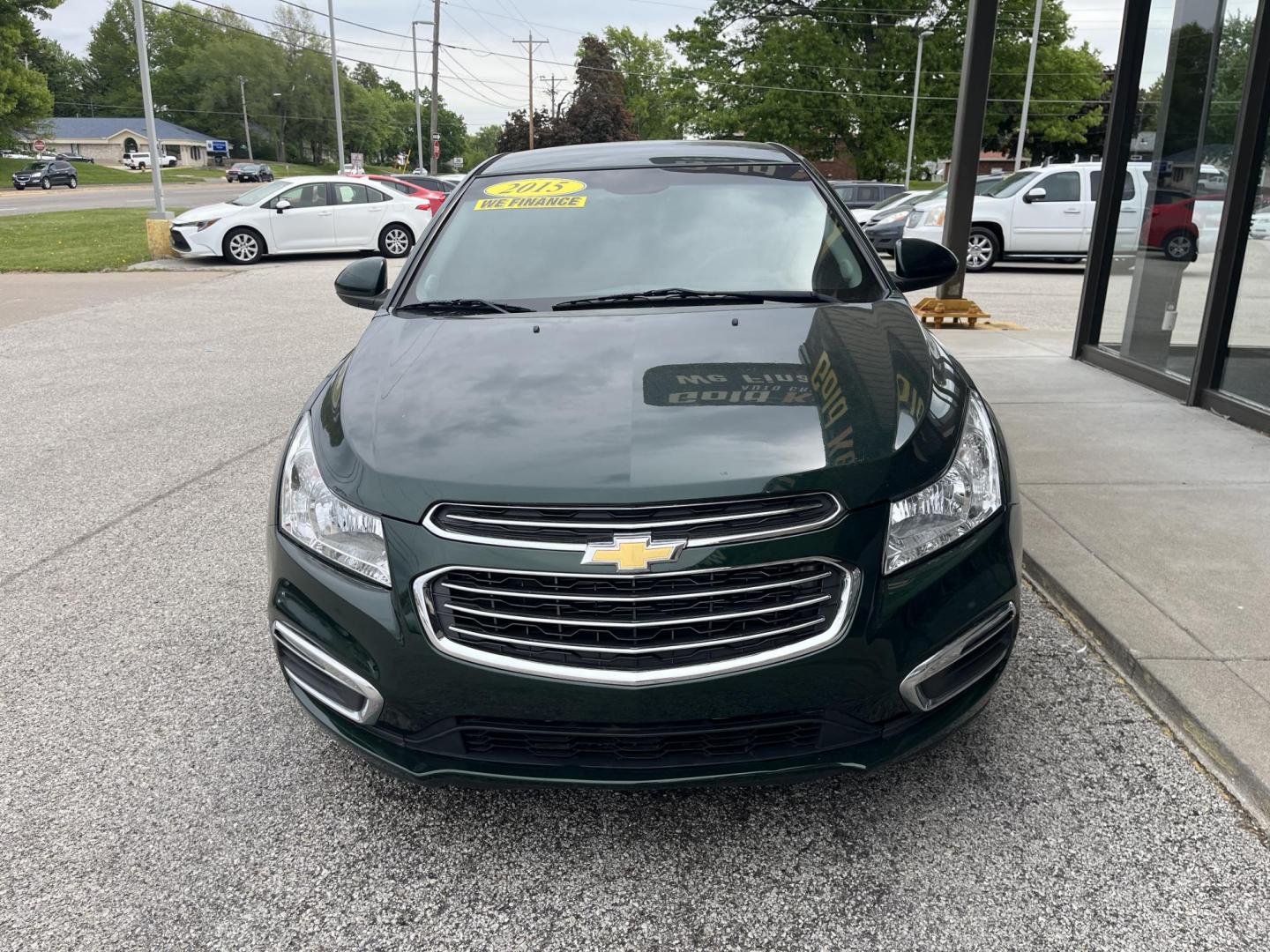 2015 Rainforest Green Metallic Chevrolet Cruze 1LT Auto (1G1PC5SB6F7) with an 1.4L L4 DOHC 16V TURBO engine, 6-Speed Automatic transmission, located at 1633 W Kimberly, Davenport, IA, 52806, (563) 323-5341, 41.559456, -90.598732 - Photo#1