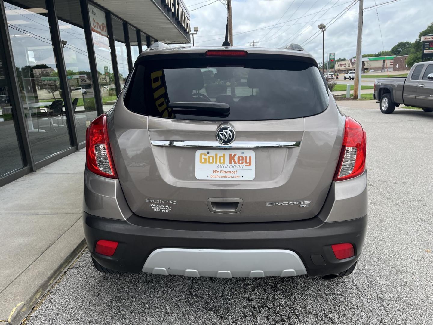 2013 Buick Encore Leather AWD (KL4CJGSB0DB) with an 1.4L L4 DOHC 16V TUR engine, 6-Speed Automatic transmission, located at 1633 W Kimberly, Davenport, IA, 52806, (563) 323-5341, 41.559456, -90.598732 - Photo#4