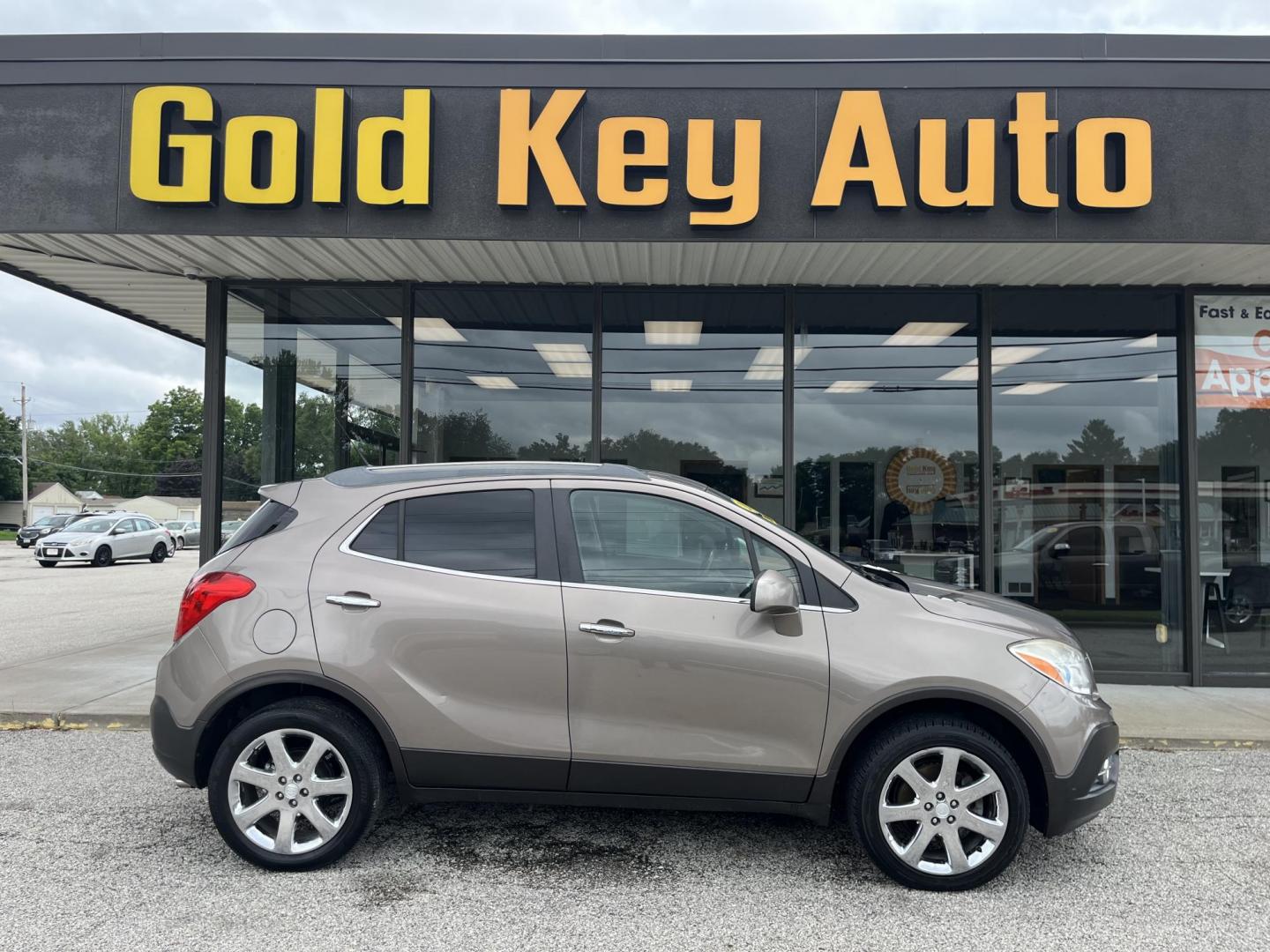 2013 Buick Encore Leather AWD (KL4CJGSB0DB) with an 1.4L L4 DOHC 16V TUR engine, 6-Speed Automatic transmission, located at 1633 W Kimberly, Davenport, IA, 52806, (563) 323-5341, 41.559456, -90.598732 - Photo#0