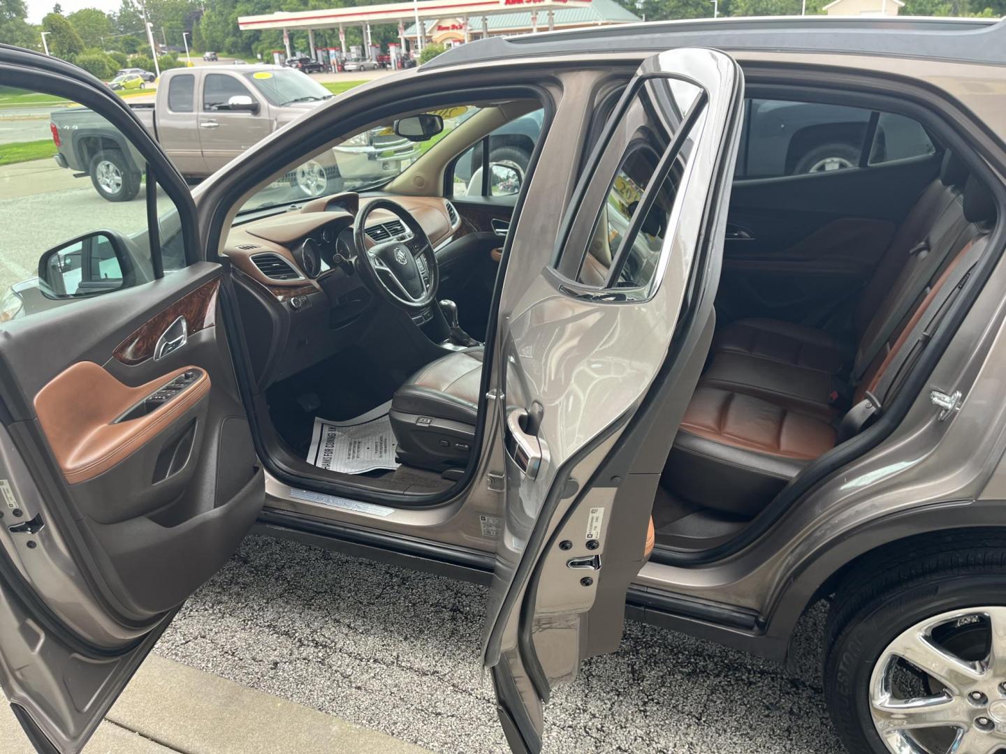 2013 Buick Encore Leather AWD (KL4CJGSB0DB) with an 1.4L L4 DOHC 16V TUR engine, 6-Speed Automatic transmission, located at 1633 W Kimberly, Davenport, IA, 52806, (563) 323-5341, 41.559456, -90.598732 - Photo#8