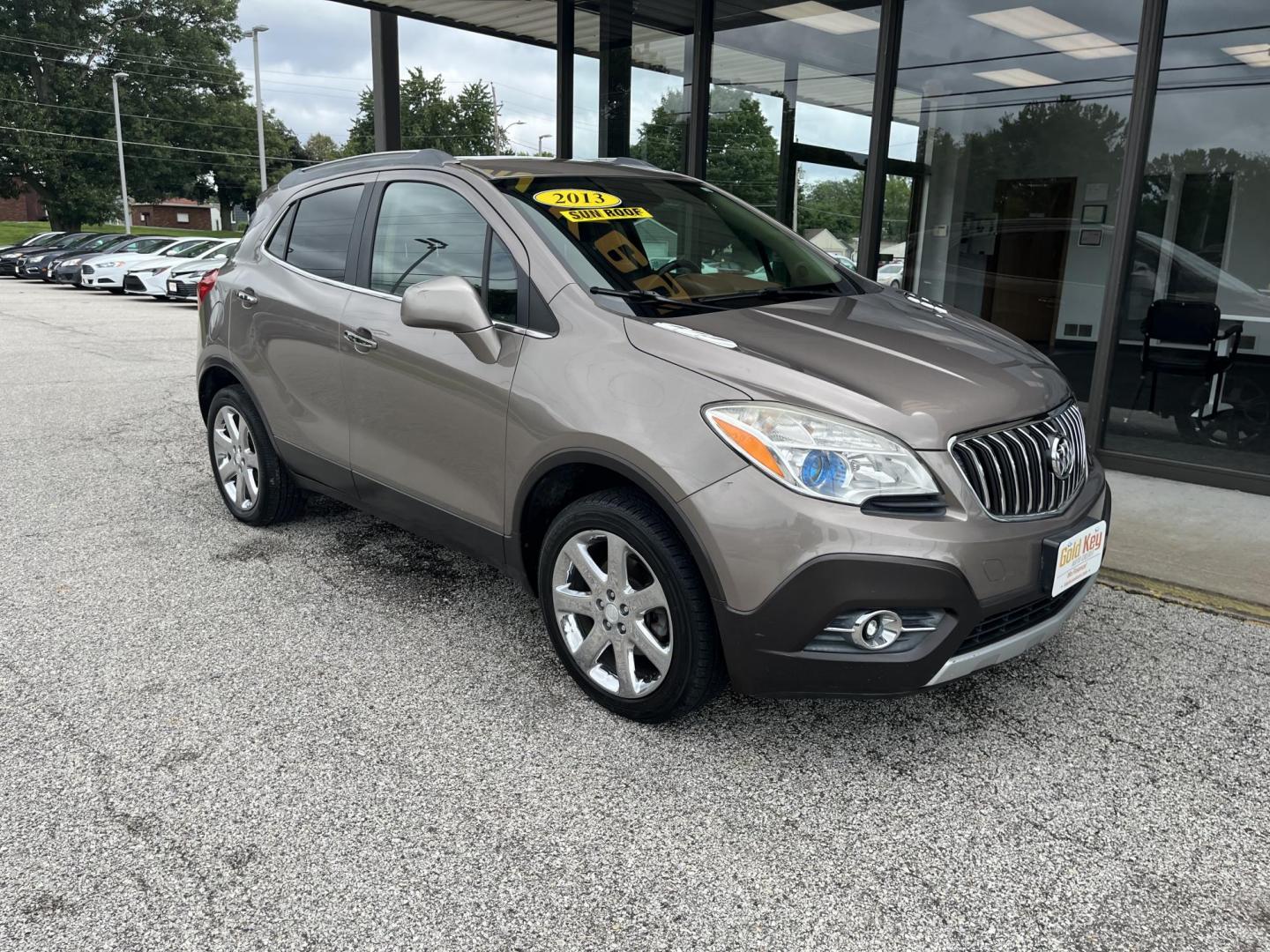 2013 Buick Encore Leather AWD (KL4CJGSB0DB) with an 1.4L L4 DOHC 16V TUR engine, 6-Speed Automatic transmission, located at 1633 W Kimberly, Davenport, IA, 52806, (563) 323-5341, 41.559456, -90.598732 - Photo#2