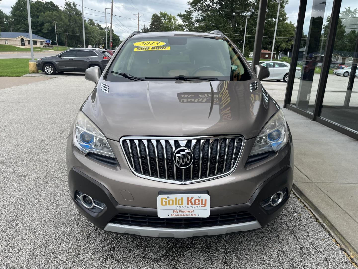 2013 Buick Encore Leather AWD (KL4CJGSB0DB) with an 1.4L L4 DOHC 16V TUR engine, 6-Speed Automatic transmission, located at 1633 W Kimberly, Davenport, IA, 52806, (563) 323-5341, 41.559456, -90.598732 - Photo#1