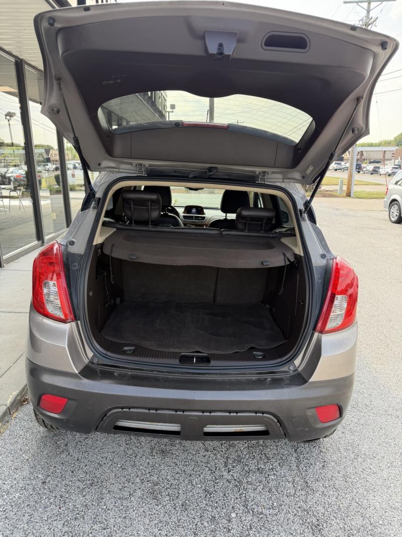 2013 Deep Espresso Brown Buick Encore Leather AWD (KL4CJGSB0DB) with an 1.4L L4 DOHC 16V TUR engine, 6-Speed Automatic transmission, located at 1633 W Kimberly, Davenport, IA, 52806, (563) 323-5341, 41.559456, -90.598732- Photo#3