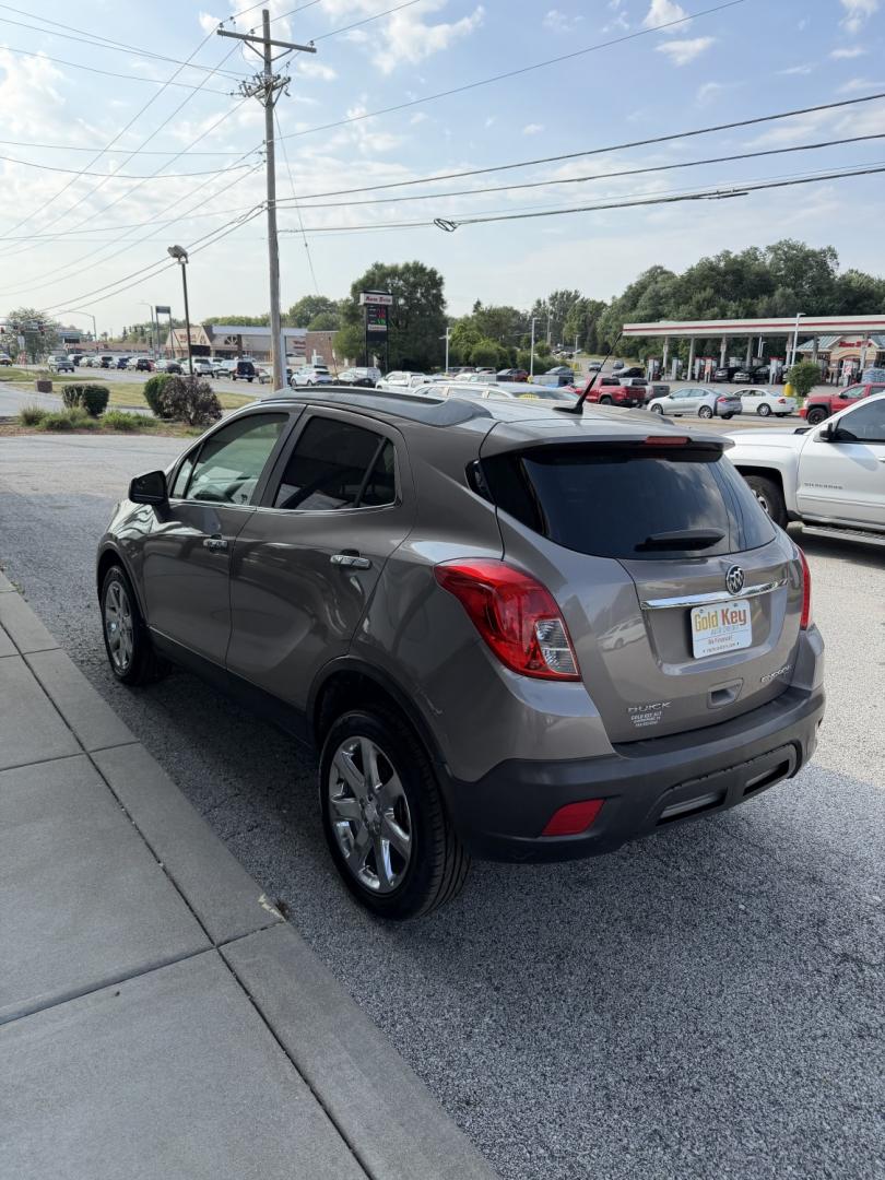 2013 Deep Espresso Brown Buick Encore Leather AWD (KL4CJGSB0DB) with an 1.4L L4 DOHC 16V TUR engine, 6-Speed Automatic transmission, located at 1633 W Kimberly, Davenport, IA, 52806, (563) 323-5341, 41.559456, -90.598732- Photo#4