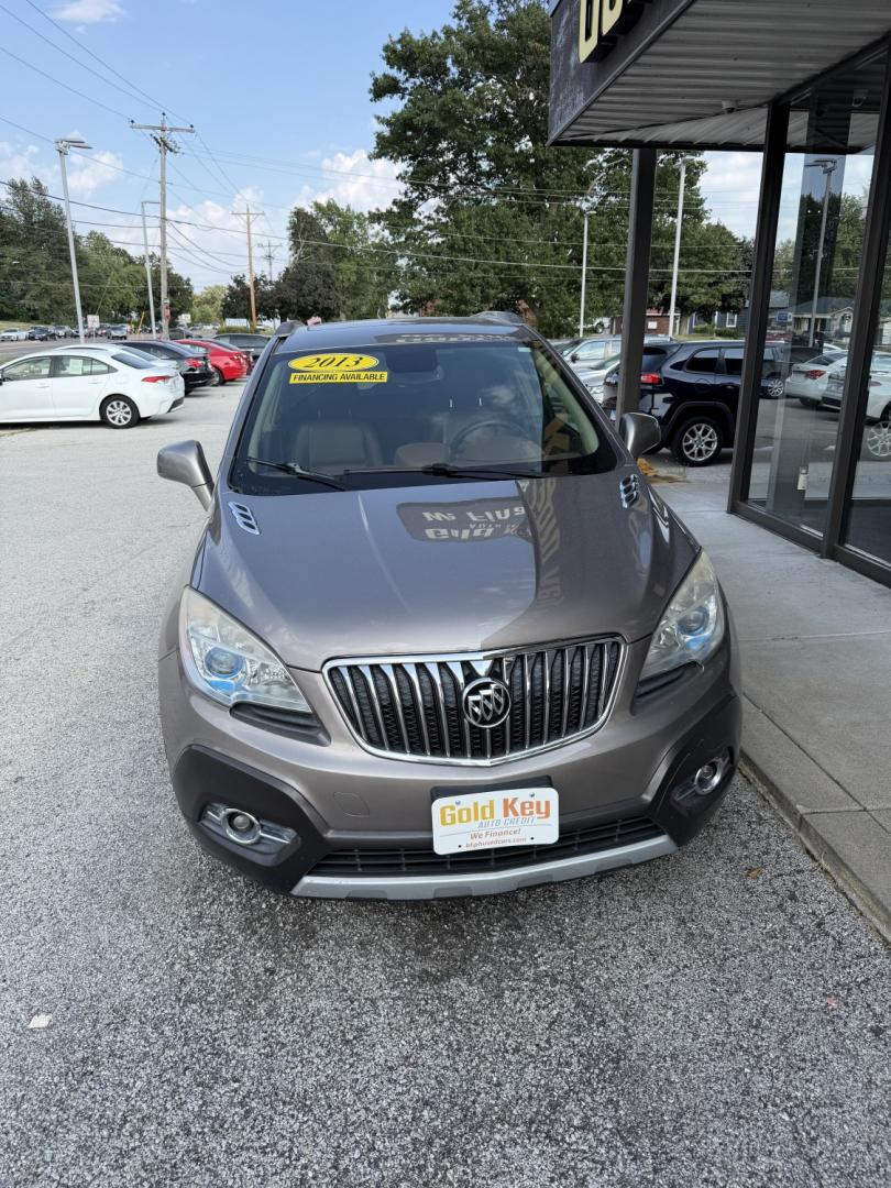 2013 Deep Espresso Brown Buick Encore Leather AWD (KL4CJGSB0DB) with an 1.4L L4 DOHC 16V TUR engine, 6-Speed Automatic transmission, located at 1633 W Kimberly, Davenport, IA, 52806, (563) 323-5341, 41.559456, -90.598732- Photo#1