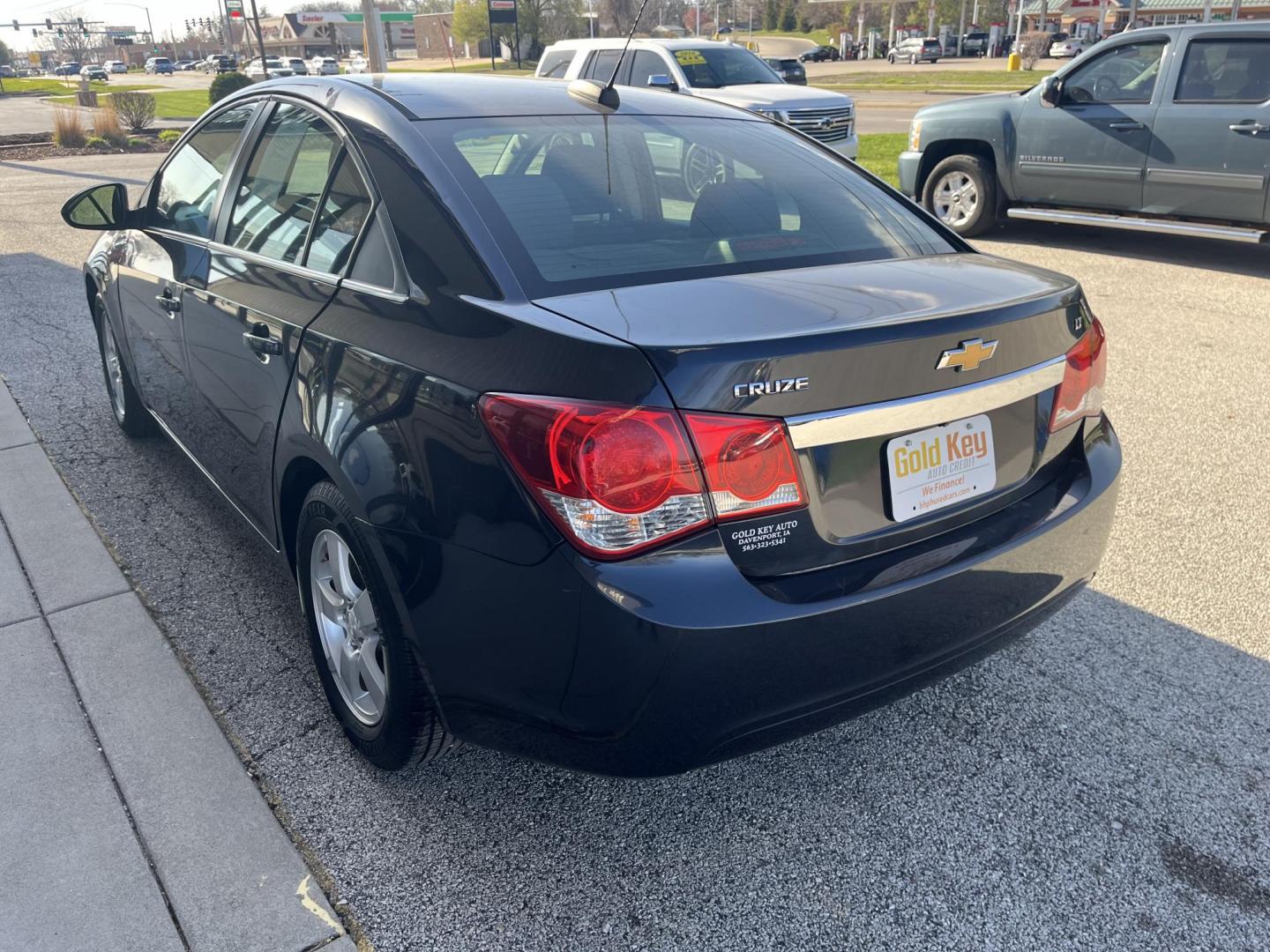 2016 Blue Chevrolet Cruze Limited 1LT Auto (1G1PE5SB6G7) with an 1.4L L4 DOHC 16V TUR engine, 6-Speed Automatic transmission, located at 1633 W Kimberly, Davenport, IA, 52806, (563) 323-5341, 41.559456, -90.598732 - Photo#3