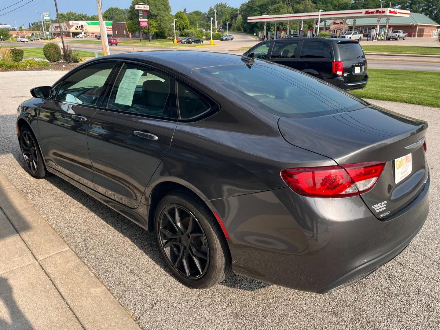 2015 Granite Crystal Met Chrysler 200 S AWD (1C3CCCDG9FN) with an 3.6L V6 DOHC 24V FFV engine, 9-Speed Automatic transmission, located at 1633 W Kimberly, Davenport, IA, 52806, (563) 323-5341, 41.559456, -90.598732 - Photo#3