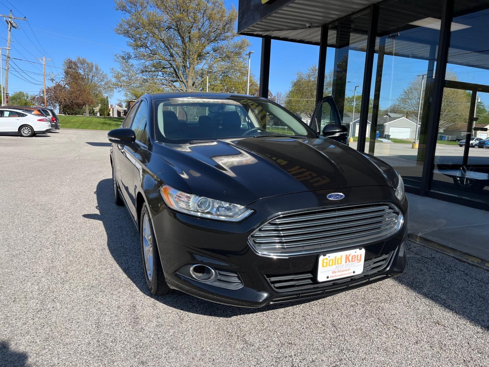 2014 Tuxedo Black Metallic Ford Fusion SE (3FA6P0HD6ER) with an 1.5L L4 DOHC 16V engine, located at 1633 W Kimberly, Davenport, 52806, (563) 323-5341, 41.559456, -90.598732 - Photo #1