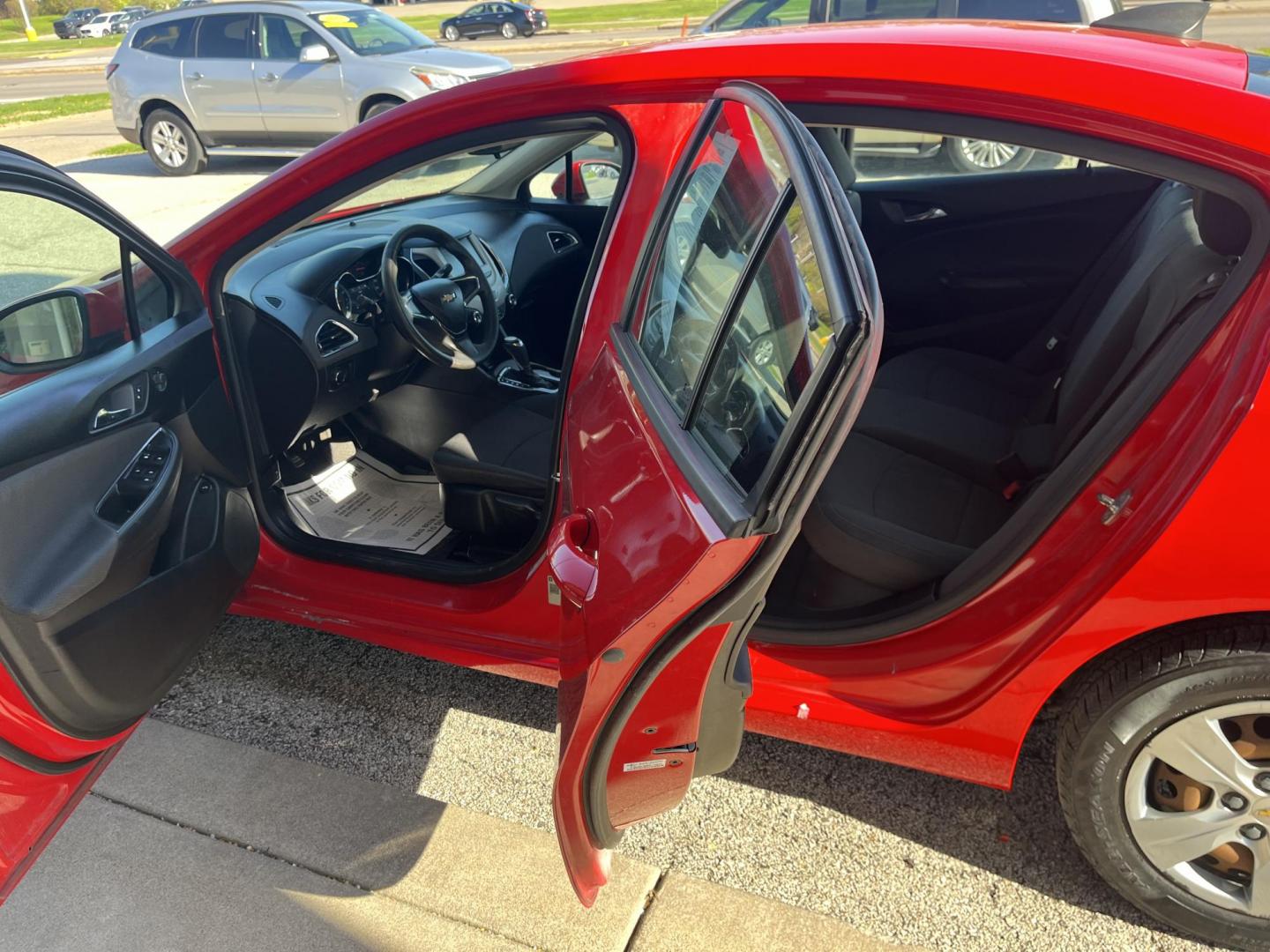 2018 Red Chevrolet Cruze LS Auto (1G1BC5SM8J7) with an 1.4L L4 DOHC 16V TUR engine, 6-Speed Automatic transmission, located at 1633 W Kimberly, Davenport, IA, 52806, (563) 323-5341, 41.559456, -90.598732 - Photo#8