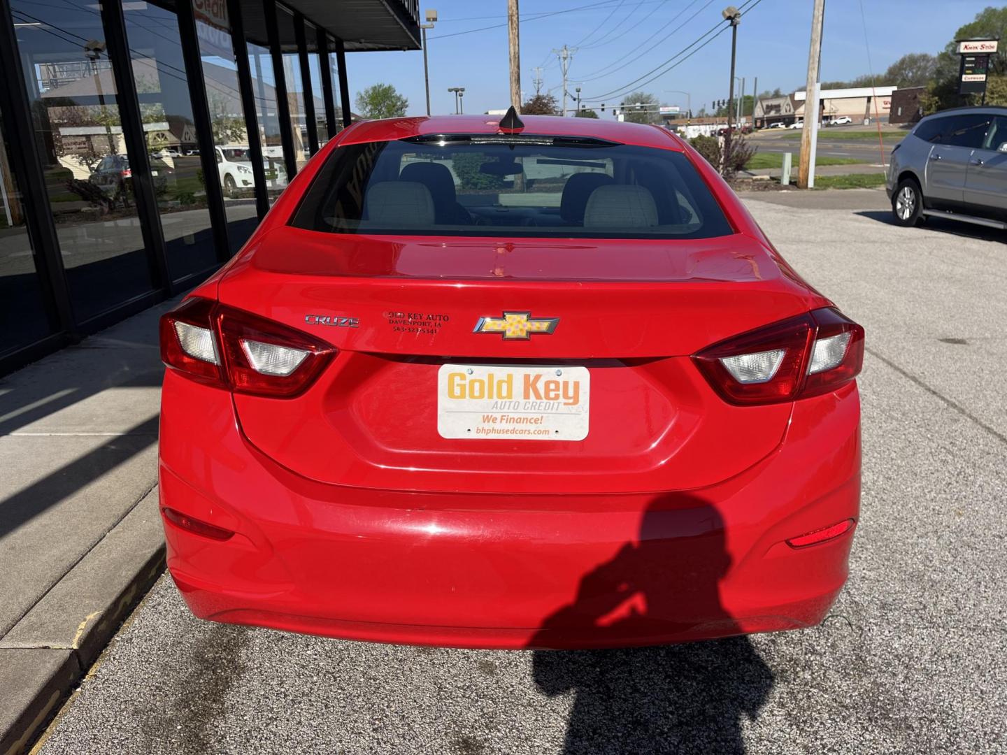 2018 Red Chevrolet Cruze LS Auto (1G1BC5SM8J7) with an 1.4L L4 DOHC 16V TUR engine, 6-Speed Automatic transmission, located at 1633 W Kimberly, Davenport, IA, 52806, (563) 323-5341, 41.559456, -90.598732 - Photo#4