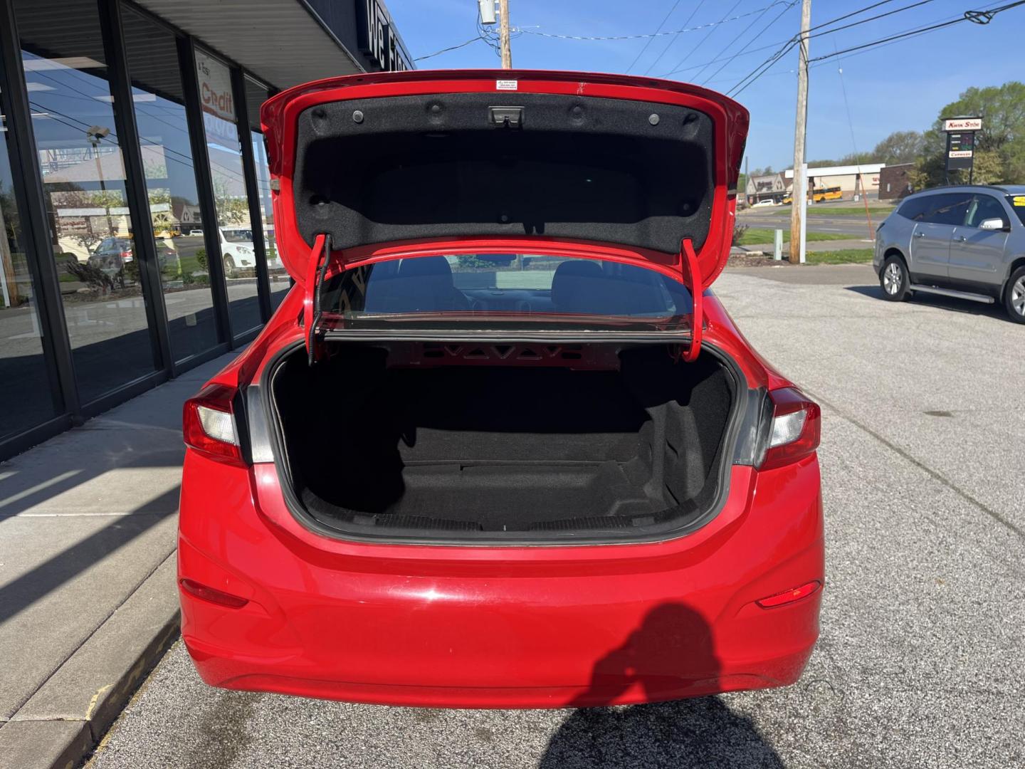 2018 Red Chevrolet Cruze LS Auto (1G1BC5SM8J7) with an 1.4L L4 DOHC 16V TUR engine, 6-Speed Automatic transmission, located at 1633 W Kimberly, Davenport, IA, 52806, (563) 323-5341, 41.559456, -90.598732 - Photo#5