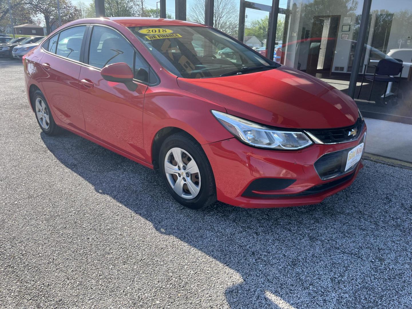 2018 Red Chevrolet Cruze LS Auto (1G1BC5SM8J7) with an 1.4L L4 DOHC 16V TUR engine, 6-Speed Automatic transmission, located at 1633 W Kimberly, Davenport, IA, 52806, (563) 323-5341, 41.559456, -90.598732 - Photo#2