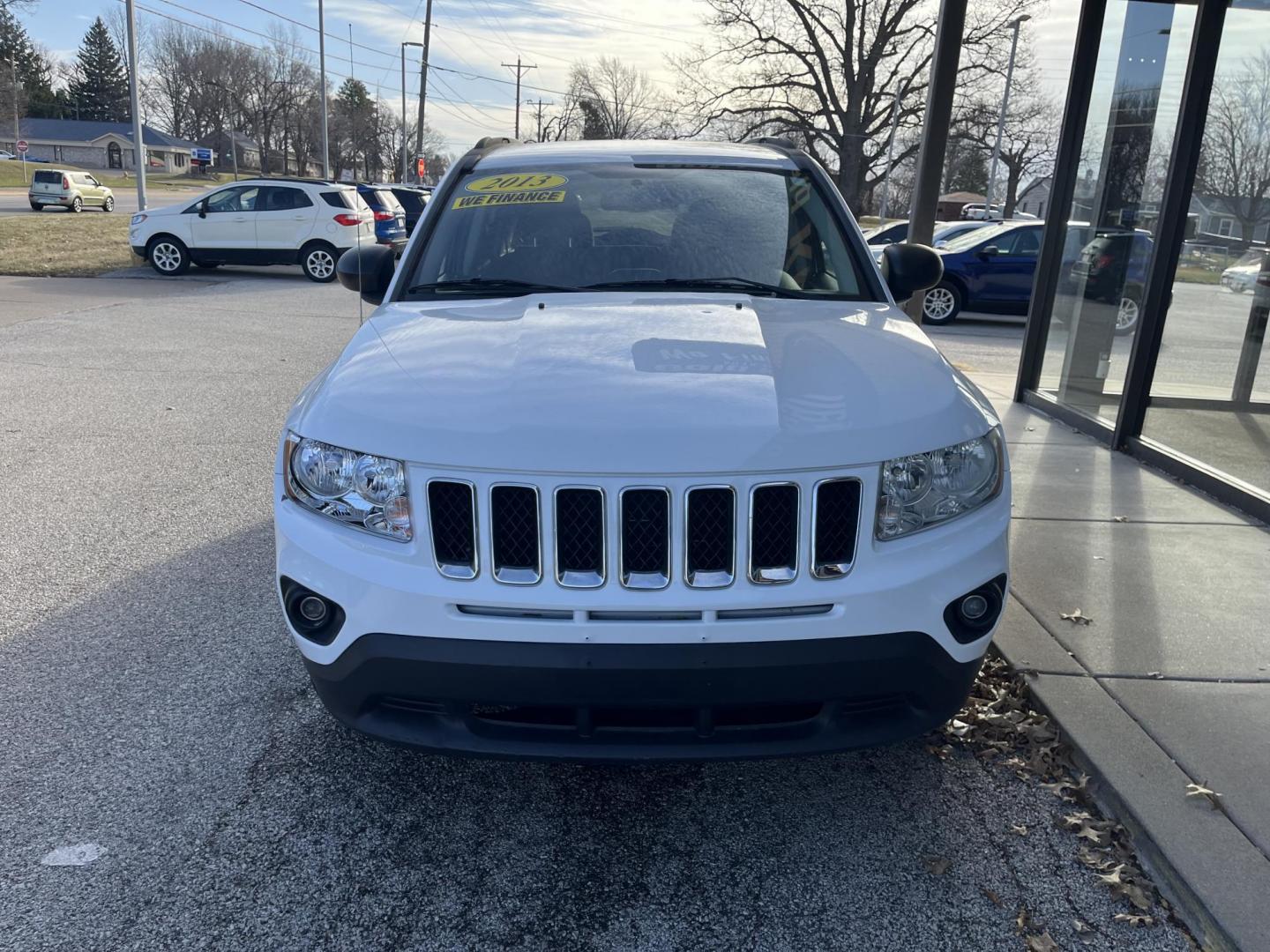 2013 Bright White Clearco Jeep Compass Latitude FWD (1C4NJCEAXDD) with an 2.0L L4 DOHC 16V engine, Continuously Variabl transmission, located at 1633 W Kimberly, Davenport, IA, 52806, (563) 323-5341, 41.559456, -90.598732 - Photo#1