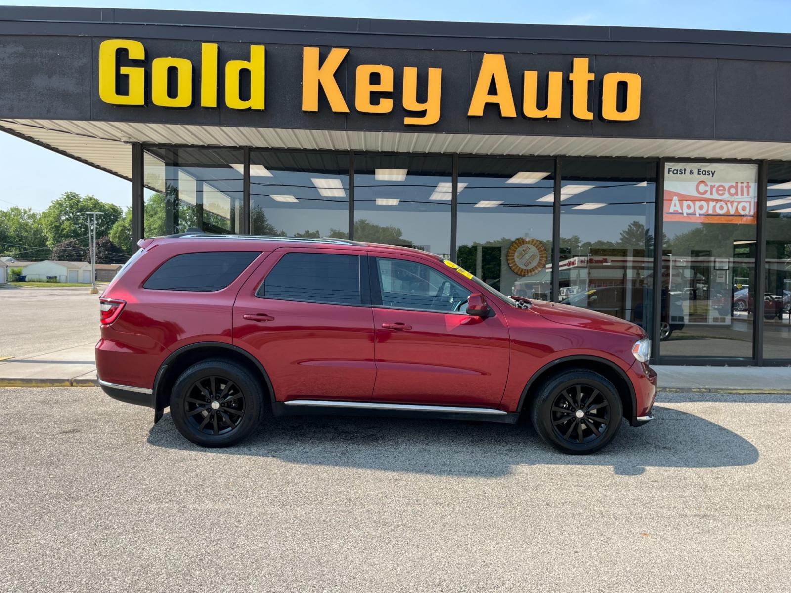 2014 Dp Cherry Red Crystal PC /Black Dodge Durango SXT AWD (1C4RDJAG9EC) with an 3.6L V6 DOHC 24V engine, 8-Speed Automatic transmission, located at 1633 W Kimberly, Davenport, 52806, (563) 323-5341, 41.559456, -90.598732 - Photo #0