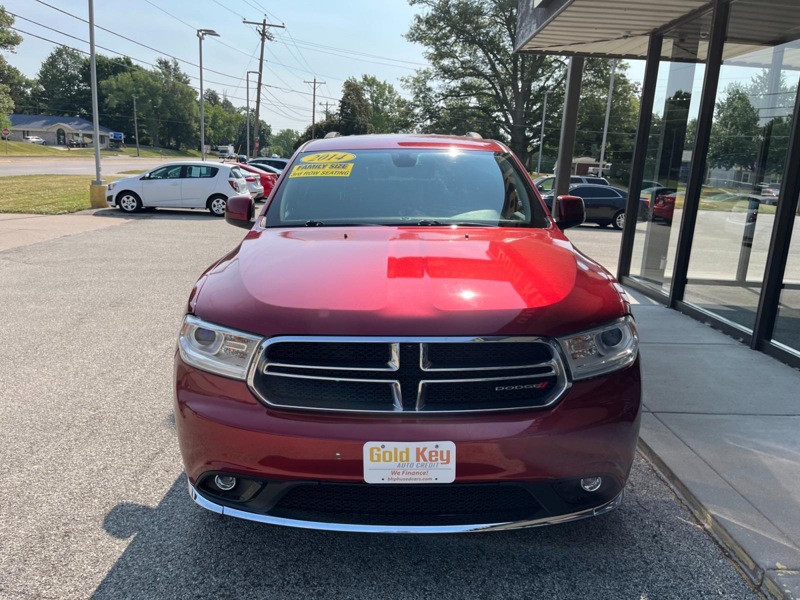 2014 Dp Cherry Red Crystal PC /Black Dodge Durango SXT AWD (1C4RDJAG9EC) with an 3.6L V6 DOHC 24V engine, 8-Speed Automatic transmission, located at 1633 W Kimberly, Davenport, 52806, (563) 323-5341, 41.559456, -90.598732 - Photo #1