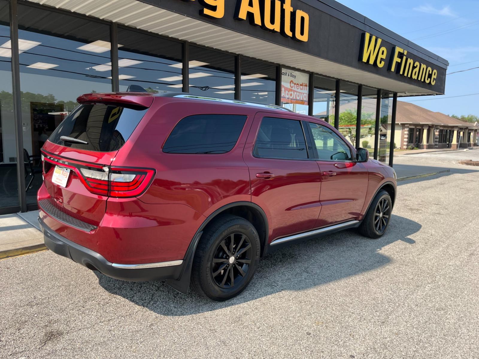 2014 Dp Cherry Red Crystal PC /Black Dodge Durango SXT AWD (1C4RDJAG9EC) with an 3.6L V6 DOHC 24V engine, 8-Speed Automatic transmission, located at 1633 W Kimberly, Davenport, 52806, (563) 323-5341, 41.559456, -90.598732 - Photo #4