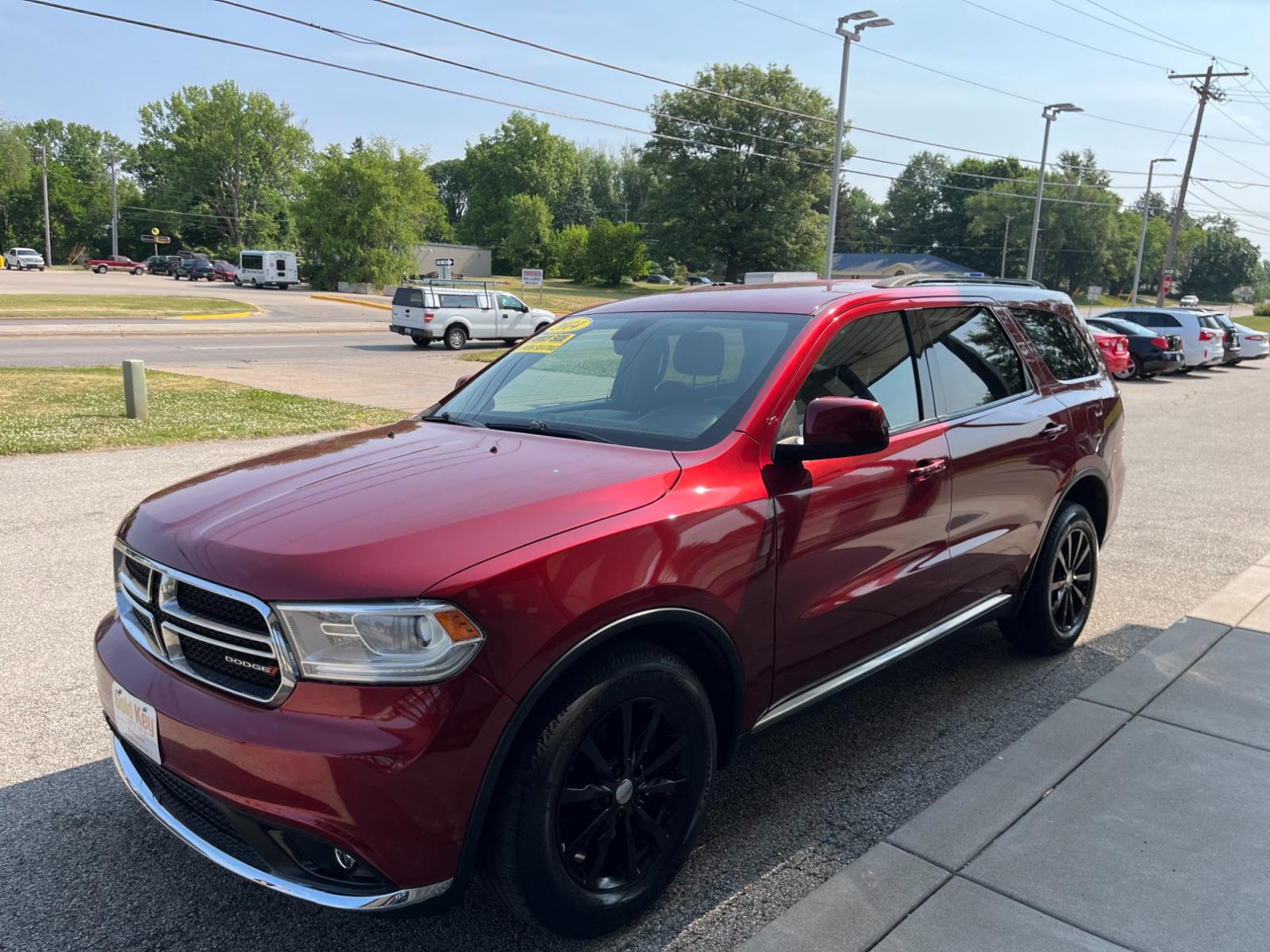 2014 Dp Cherry Red Crystal PC /Black Dodge Durango SXT AWD (1C4RDJAG9EC) with an 3.6L V6 DOHC 24V engine, 8-Speed Automatic transmission, located at 1633 W Kimberly, Davenport, 52806, (563) 323-5341, 41.559456, -90.598732 - Photo #5
