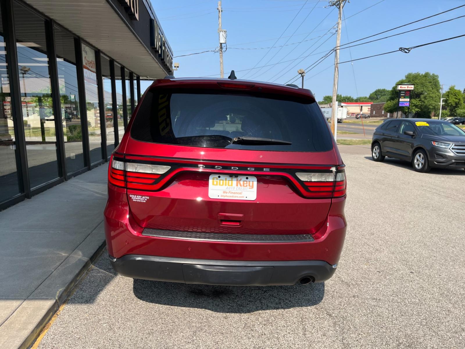 2014 Dp Cherry Red Crystal PC /Black Dodge Durango SXT AWD (1C4RDJAG9EC) with an 3.6L V6 DOHC 24V engine, 8-Speed Automatic transmission, located at 1633 W Kimberly, Davenport, 52806, (563) 323-5341, 41.559456, -90.598732 - Photo #2