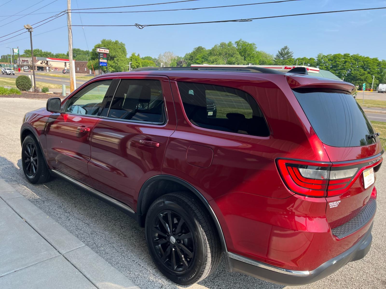 2014 Dp Cherry Red Crystal PC /Black Dodge Durango SXT AWD (1C4RDJAG9EC) with an 3.6L V6 DOHC 24V engine, 8-Speed Automatic transmission, located at 1633 W Kimberly, Davenport, 52806, (563) 323-5341, 41.559456, -90.598732 - Photo #3