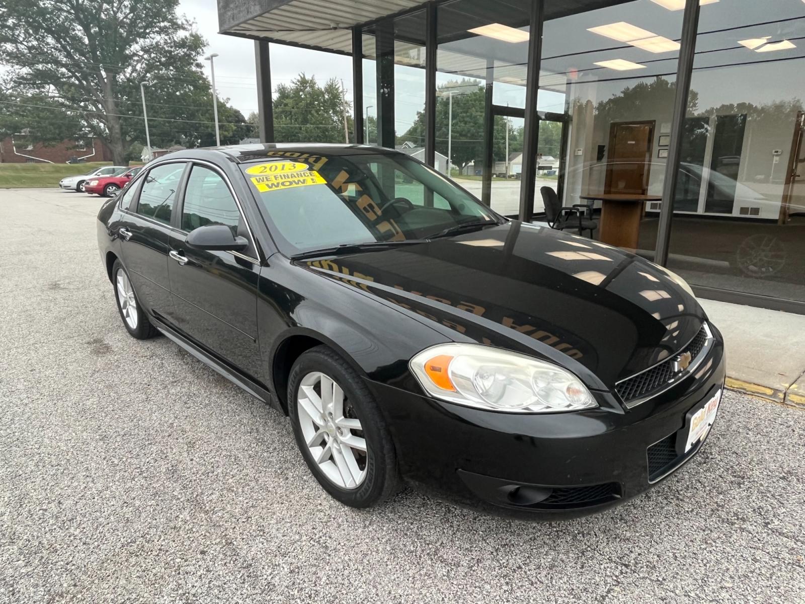 2013 Black Raven Chevrolet Impala LTZ (2G1WC5E36D1) with an 3.6L V6 DOHC 16V FFV engine, 6-Speed Automatic transmission, located at 1633 W Kimberly, Davenport, 52806, (563) 323-5341, 41.559456, -90.598732 - Photo #2