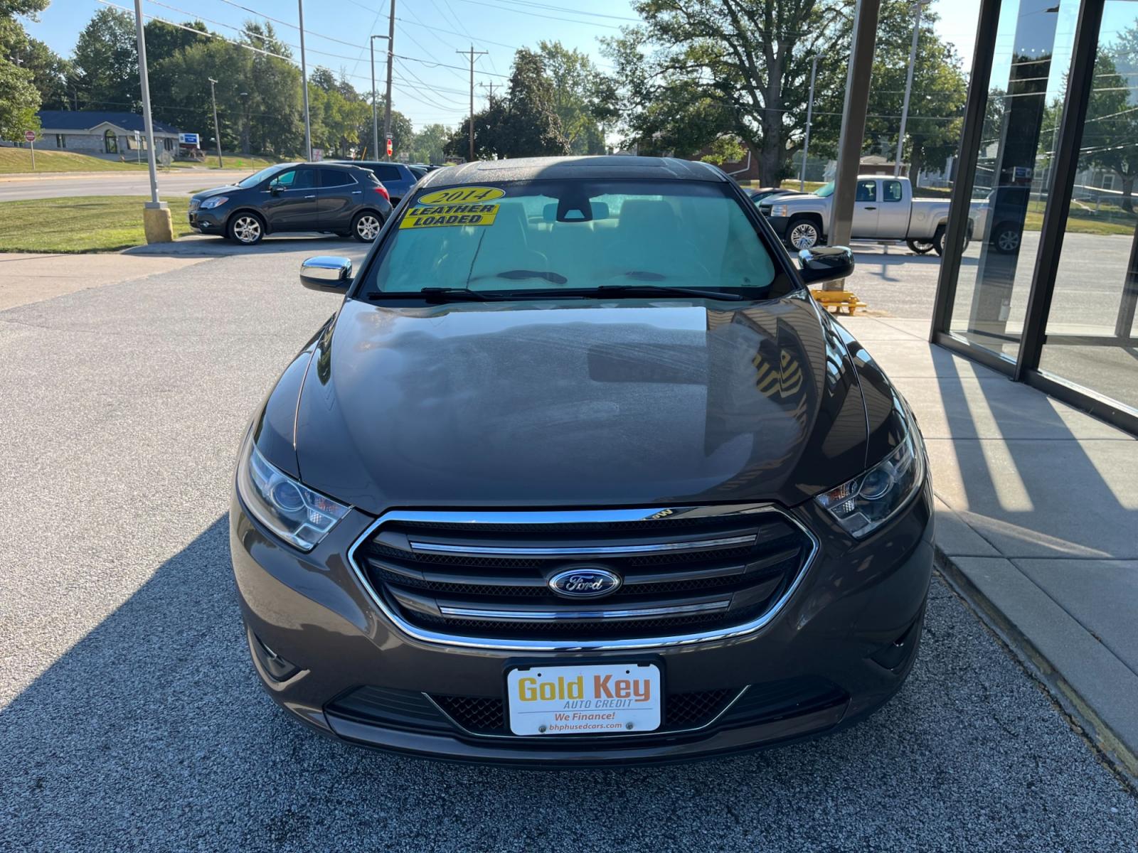 2015 Caribou Metallic Ford Taurus Limited FWD (1FAHP2F85FG) with an 3.5L V6 DOHC 24V engine, 6-Speed Automatic transmission, located at 1633 W Kimberly, Davenport, 52806, (563) 323-5341, 41.559456, -90.598732 - Photo #1