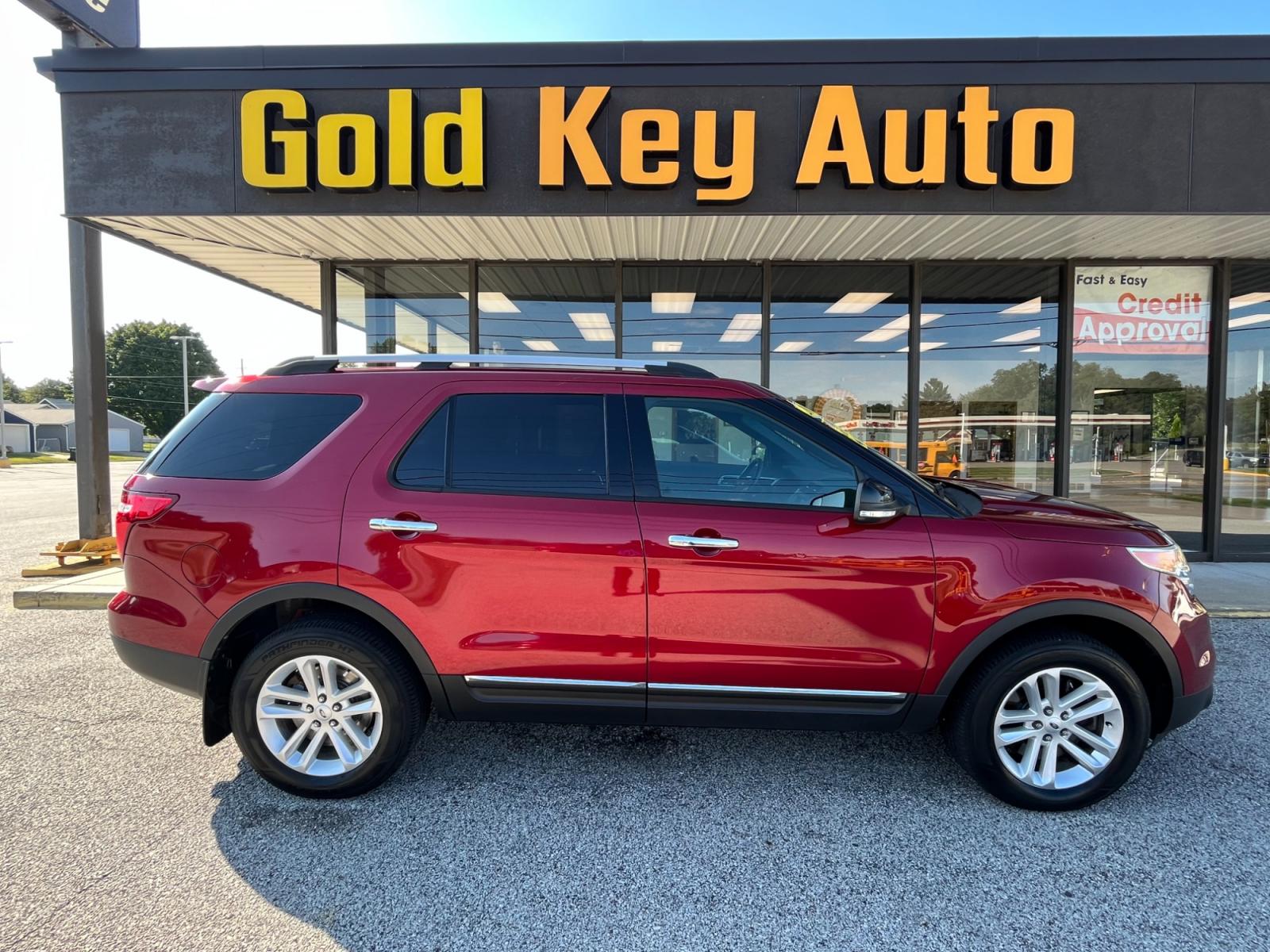 2015 Ruby Red Metallic Tinted Clearcoat Ford Explorer XLT 4WD (1FM5K8D88FG) with an 3.5L V6 DOHC 24V engine, 6-Speed Automatic transmission, located at 1633 W Kimberly, Davenport, 52806, (563) 323-5341, 41.559456, -90.598732 - Photo #0