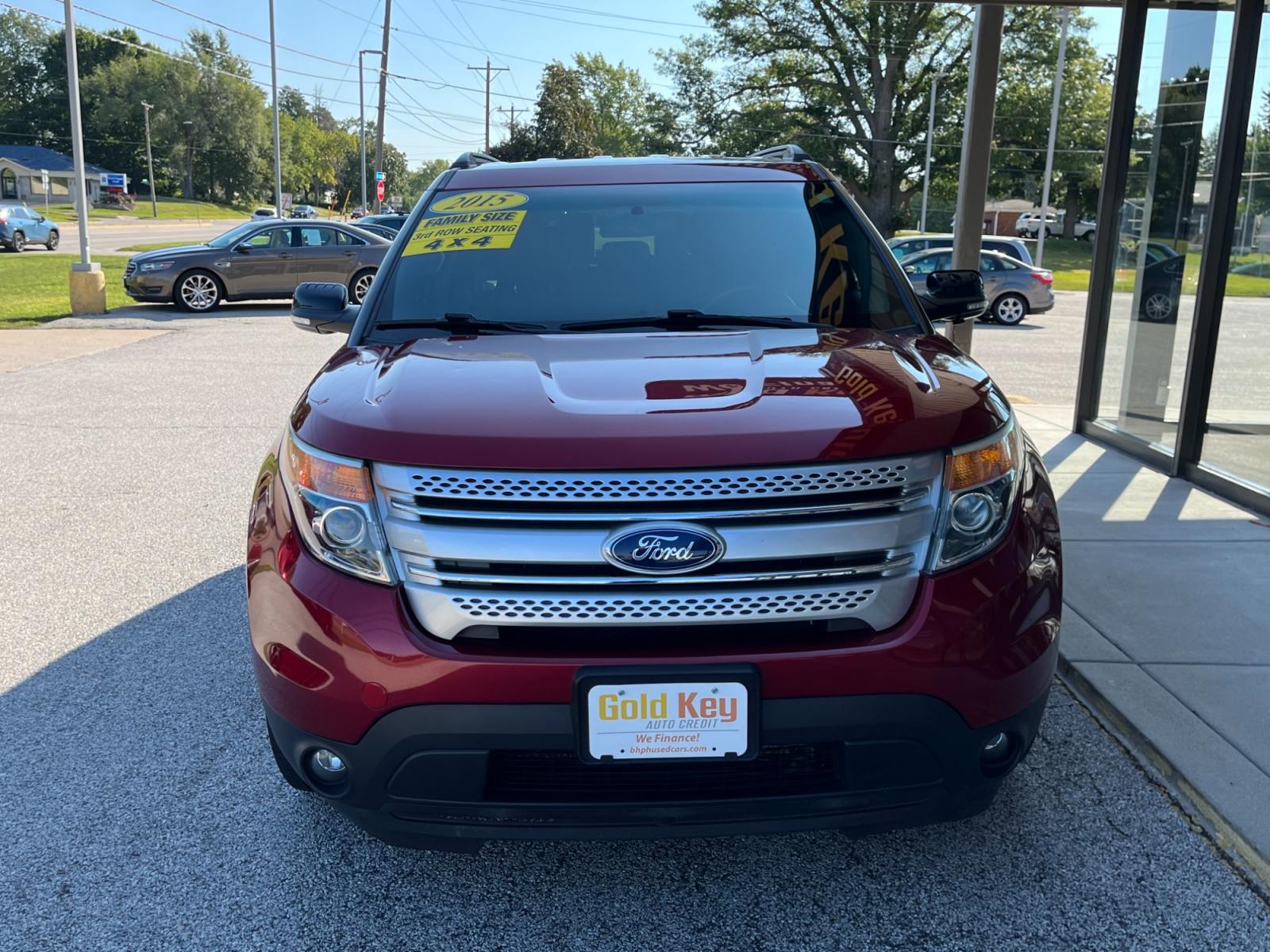 2015 Ruby Red Metallic Tinted Clearcoat Ford Explorer XLT 4WD (1FM5K8D88FG) with an 3.5L V6 DOHC 24V engine, 6-Speed Automatic transmission, located at 1633 W Kimberly, Davenport, 52806, (563) 323-5341, 41.559456, -90.598732 - Photo #1