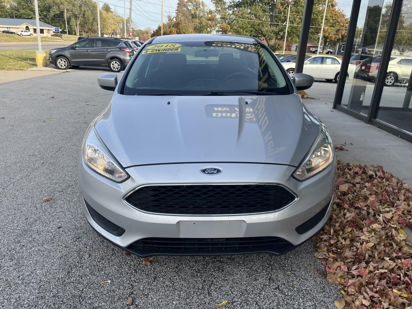2018 Ingot Silver Metalli Ford Focus SE Sedan (1FADP3F24JL) with an 2.0L L4 DOHC 16V engine, located at 1633 W Kimberly, Davenport, IA, 52806, (563) 323-5341, 41.559456, -90.598732 - Photo#1