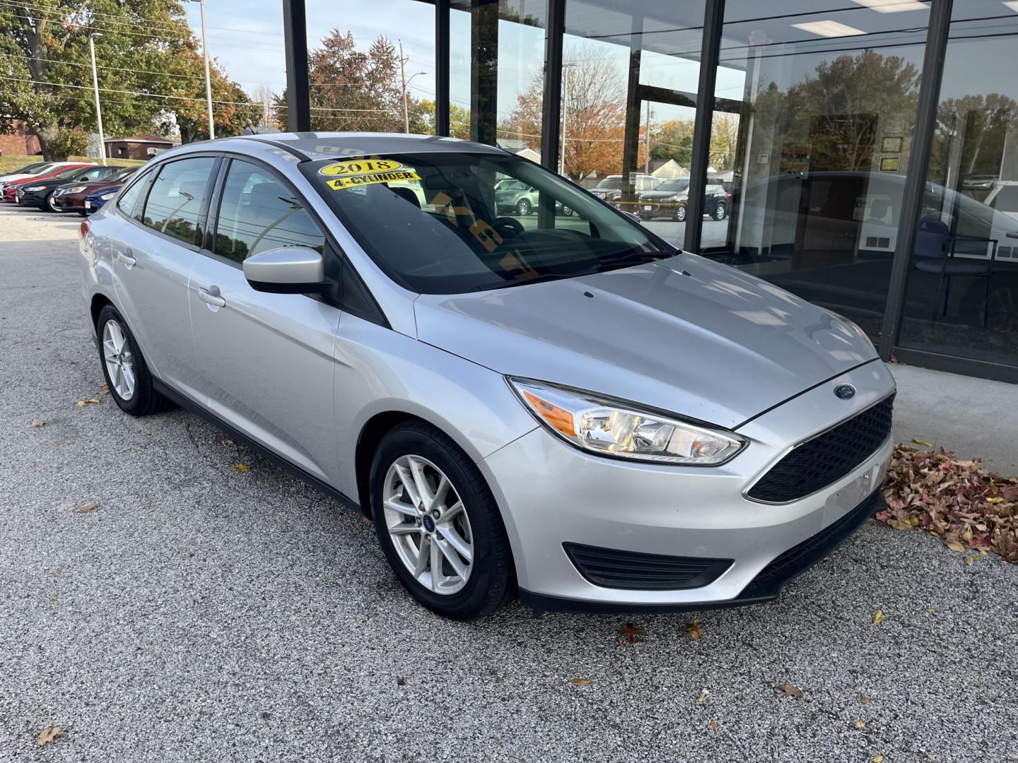 2018 Ingot Silver Metalli Ford Focus SE Sedan (1FADP3F24JL) with an 2.0L L4 DOHC 16V engine, located at 1633 W Kimberly, Davenport, IA, 52806, (563) 323-5341, 41.559456, -90.598732 - Photo#2