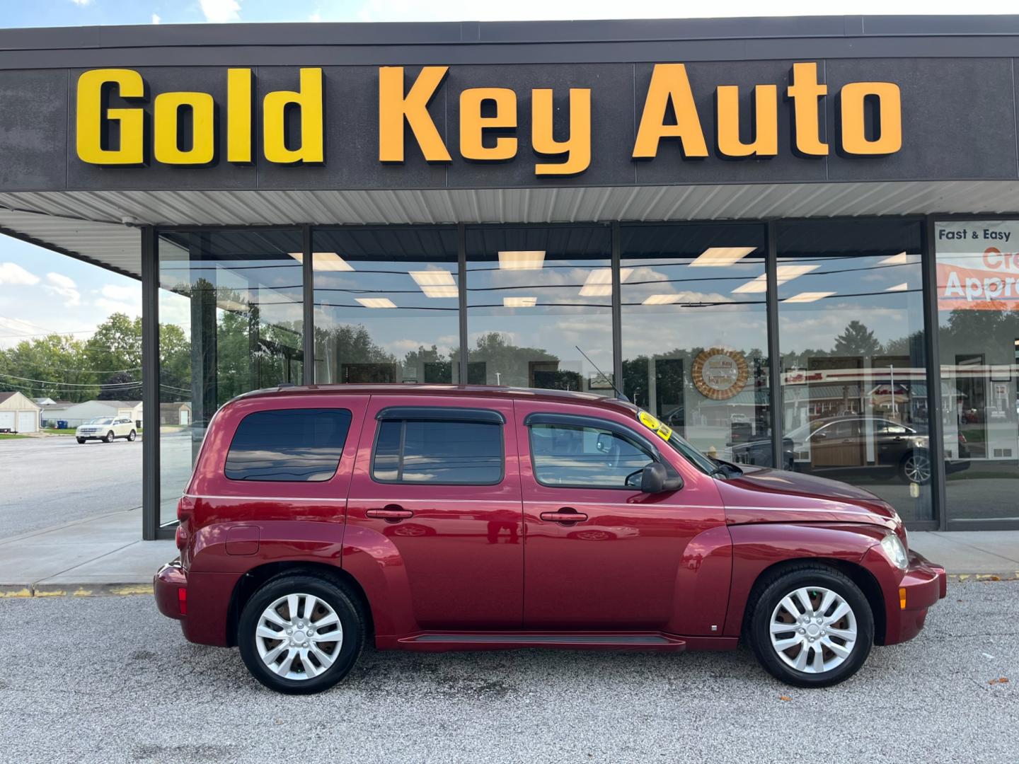 2009 Victory Red Chevrolet HHR LS (3GNCA13B69S) with an 2.2L L4 DOHC 16V engine, 4-Speed Automatic transmission, located at 1633 W Kimberly, Davenport, IA, 52806, (563) 323-5341, 41.559456, -90.598732 - Photo#0