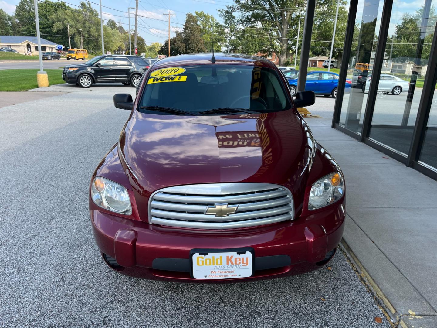2009 Victory Red Chevrolet HHR LS (3GNCA13B69S) with an 2.2L L4 DOHC 16V engine, 4-Speed Automatic transmission, located at 1633 W Kimberly, Davenport, IA, 52806, (563) 323-5341, 41.559456, -90.598732 - Photo#1