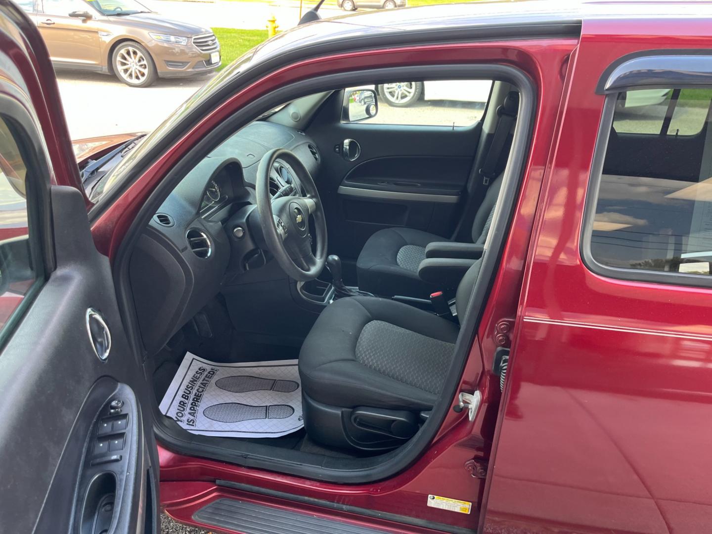 2009 Victory Red Chevrolet HHR LS (3GNCA13B69S) with an 2.2L L4 DOHC 16V engine, 4-Speed Automatic transmission, located at 1633 W Kimberly, Davenport, IA, 52806, (563) 323-5341, 41.559456, -90.598732 - Photo#8