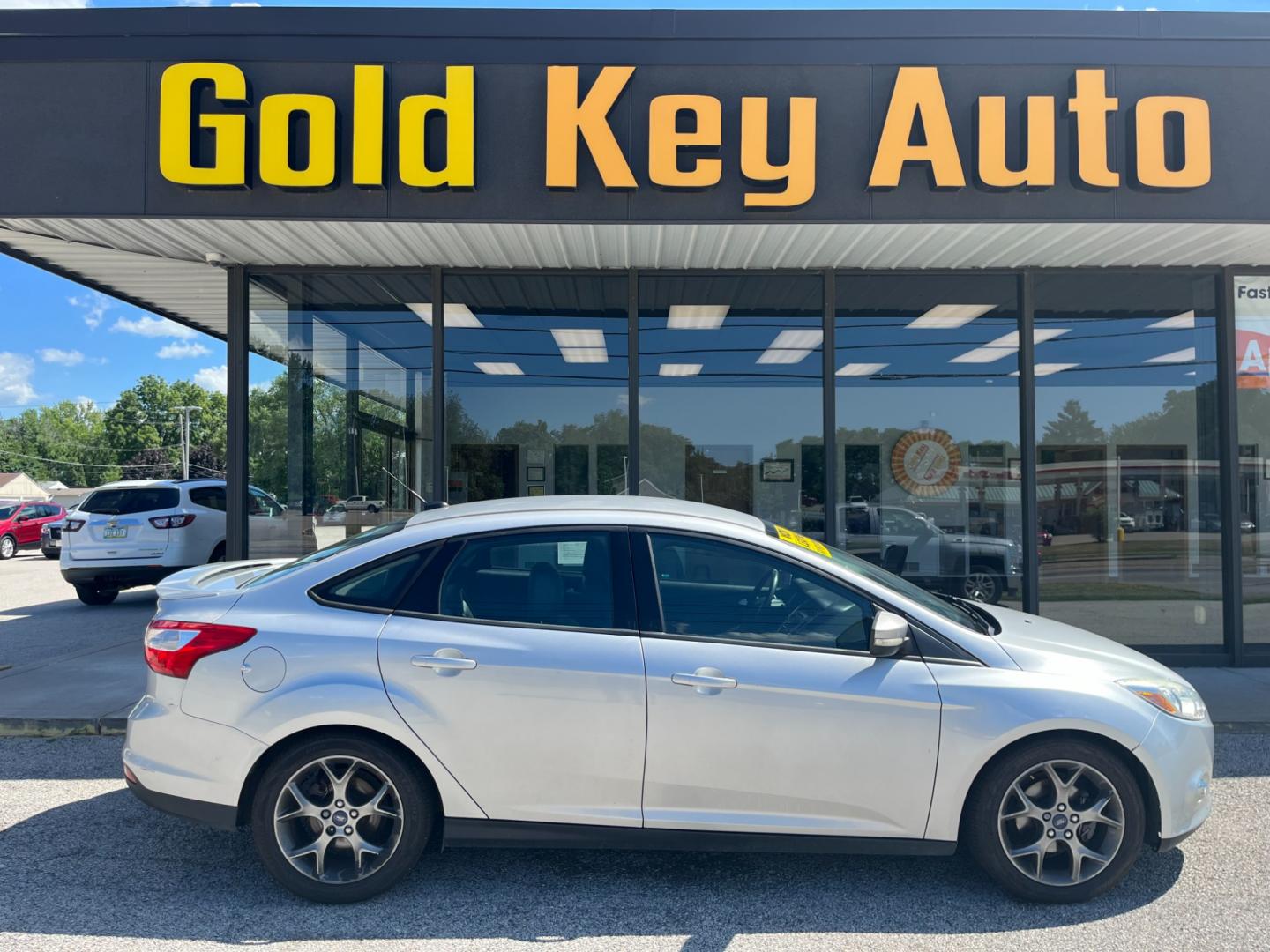 2014 Ingot Silver Metalli Ford Focus SE Sedan (1FADP3F27EL) with an 2.0L L4 DOHC 16V engine, located at 1633 W Kimberly, Davenport, IA, 52806, (563) 323-5341, 41.559456, -90.598732 - Photo#0