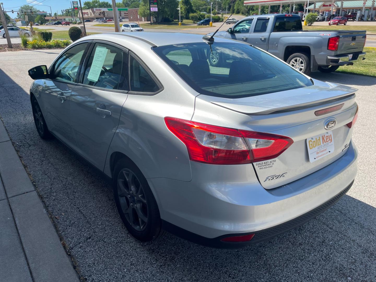 2014 Ingot Silver Metalli Ford Focus SE Sedan (1FADP3F27EL) with an 2.0L L4 DOHC 16V engine, located at 1633 W Kimberly, Davenport, IA, 52806, (563) 323-5341, 41.559456, -90.598732 - Photo#3
