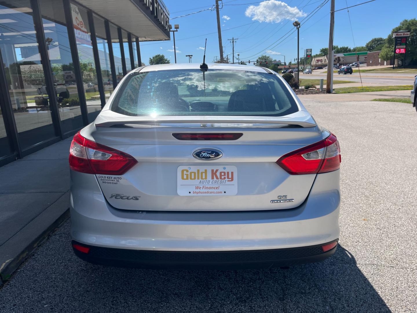 2014 Ingot Silver Metalli Ford Focus SE Sedan (1FADP3F27EL) with an 2.0L L4 DOHC 16V engine, located at 1633 W Kimberly, Davenport, IA, 52806, (563) 323-5341, 41.559456, -90.598732 - Photo#4