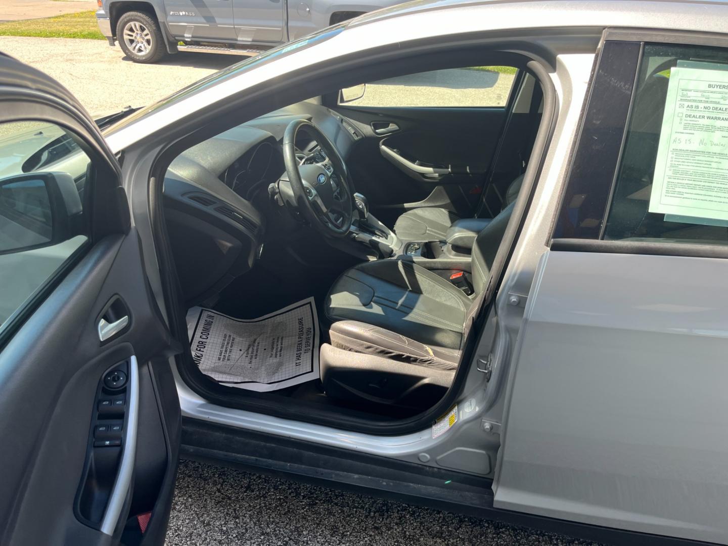 2014 Ingot Silver Metalli Ford Focus SE Sedan (1FADP3F27EL) with an 2.0L L4 DOHC 16V engine, located at 1633 W Kimberly, Davenport, IA, 52806, (563) 323-5341, 41.559456, -90.598732 - Photo#9