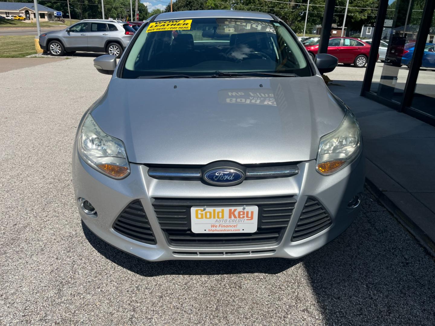 2014 Ingot Silver Metalli Ford Focus SE Sedan (1FADP3F27EL) with an 2.0L L4 DOHC 16V engine, located at 1633 W Kimberly, Davenport, IA, 52806, (563) 323-5341, 41.559456, -90.598732 - Photo#1