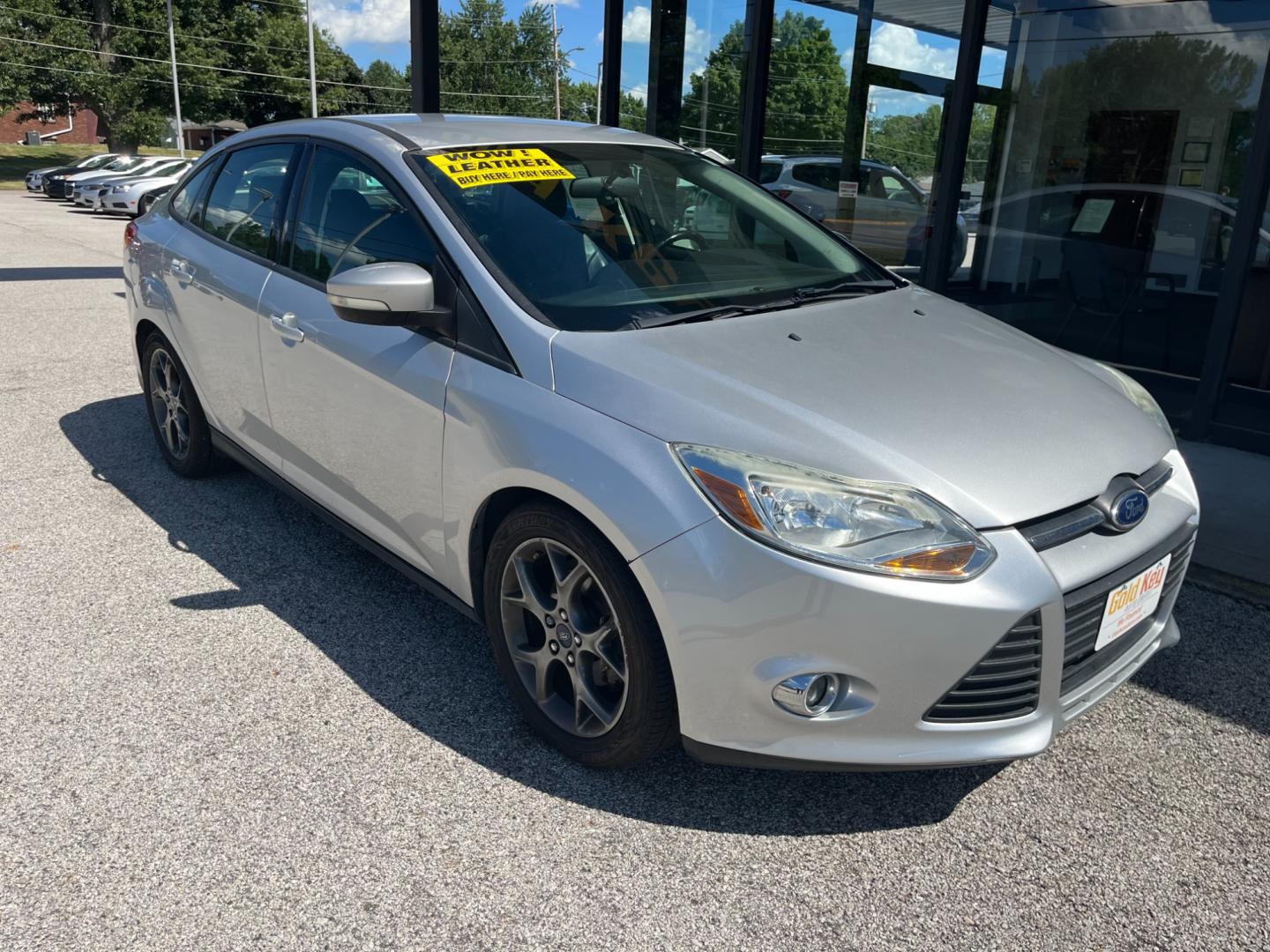 2014 Ingot Silver Metalli Ford Focus SE Sedan (1FADP3F27EL) with an 2.0L L4 DOHC 16V engine, located at 1633 W Kimberly, Davenport, IA, 52806, (563) 323-5341, 41.559456, -90.598732 - Photo#2