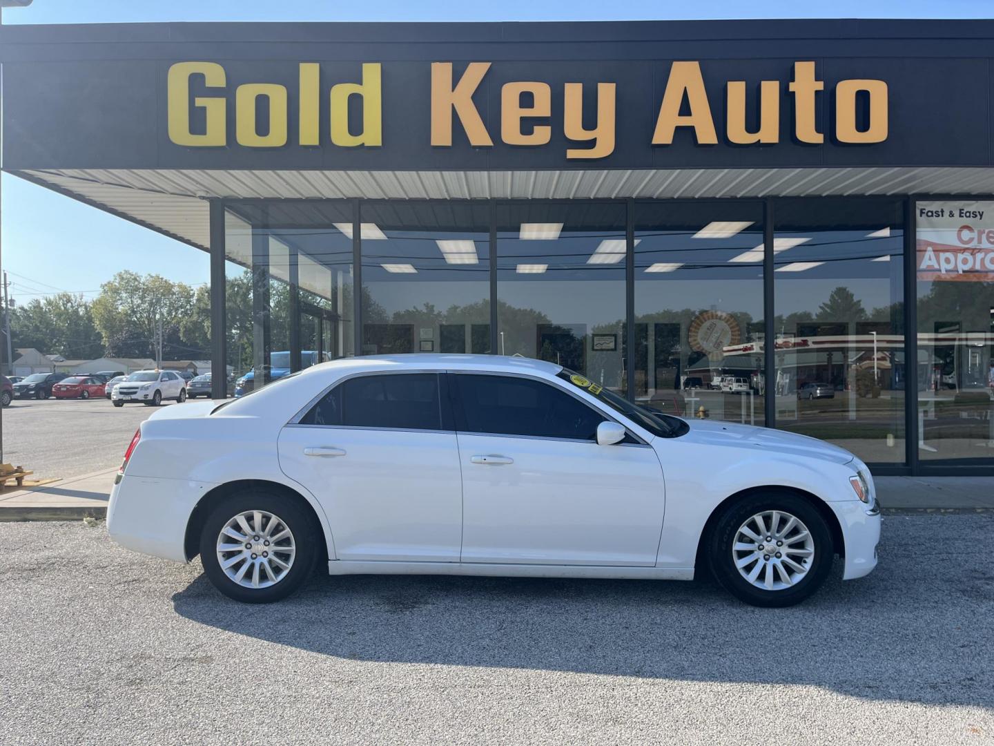 2013 Bright White Chrysler 300 RWD (2C3CCAAG2DH) with an 3.6L V6 SOHC 24V engine, 8-Speed Automatic transmission, located at 1633 W Kimberly, Davenport, IA, 52806, (563) 323-5341, 41.559456, -90.598732 - Photo#0