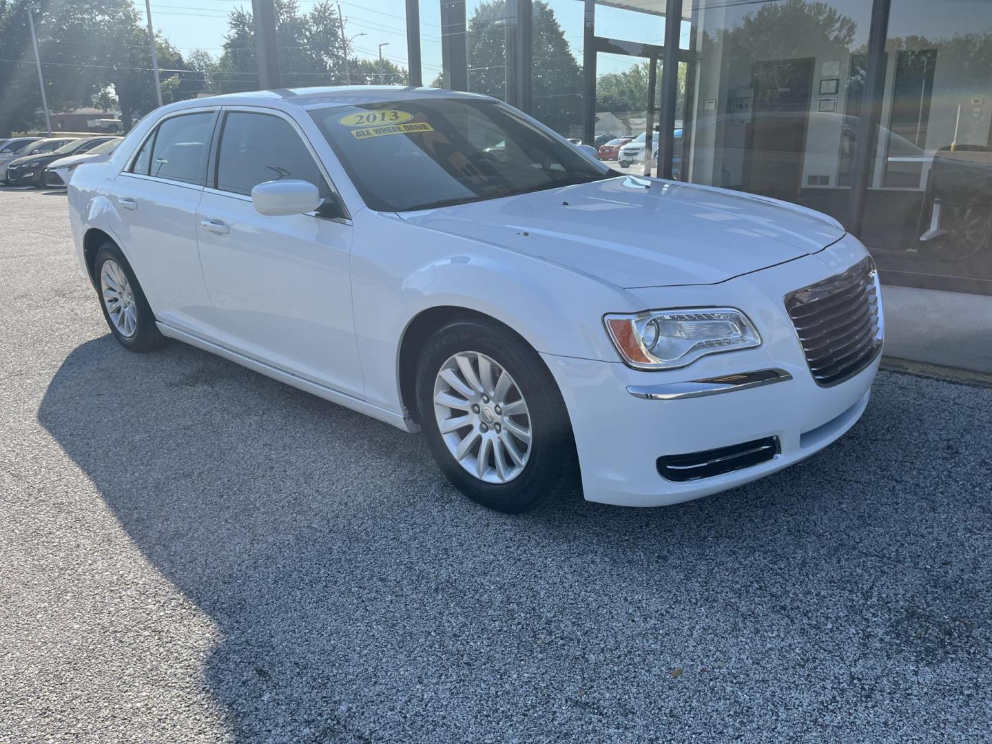 2013 Bright White Chrysler 300 RWD (2C3CCAAG2DH) with an 3.6L V6 SOHC 24V engine, 8-Speed Automatic transmission, located at 1633 W Kimberly, Davenport, IA, 52806, (563) 323-5341, 41.559456, -90.598732 - Photo#2