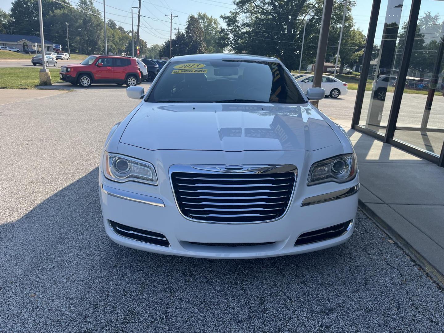 2013 Bright White Chrysler 300 RWD (2C3CCAAG2DH) with an 3.6L V6 SOHC 24V engine, 8-Speed Automatic transmission, located at 1633 W Kimberly, Davenport, IA, 52806, (563) 323-5341, 41.559456, -90.598732 - Photo#1