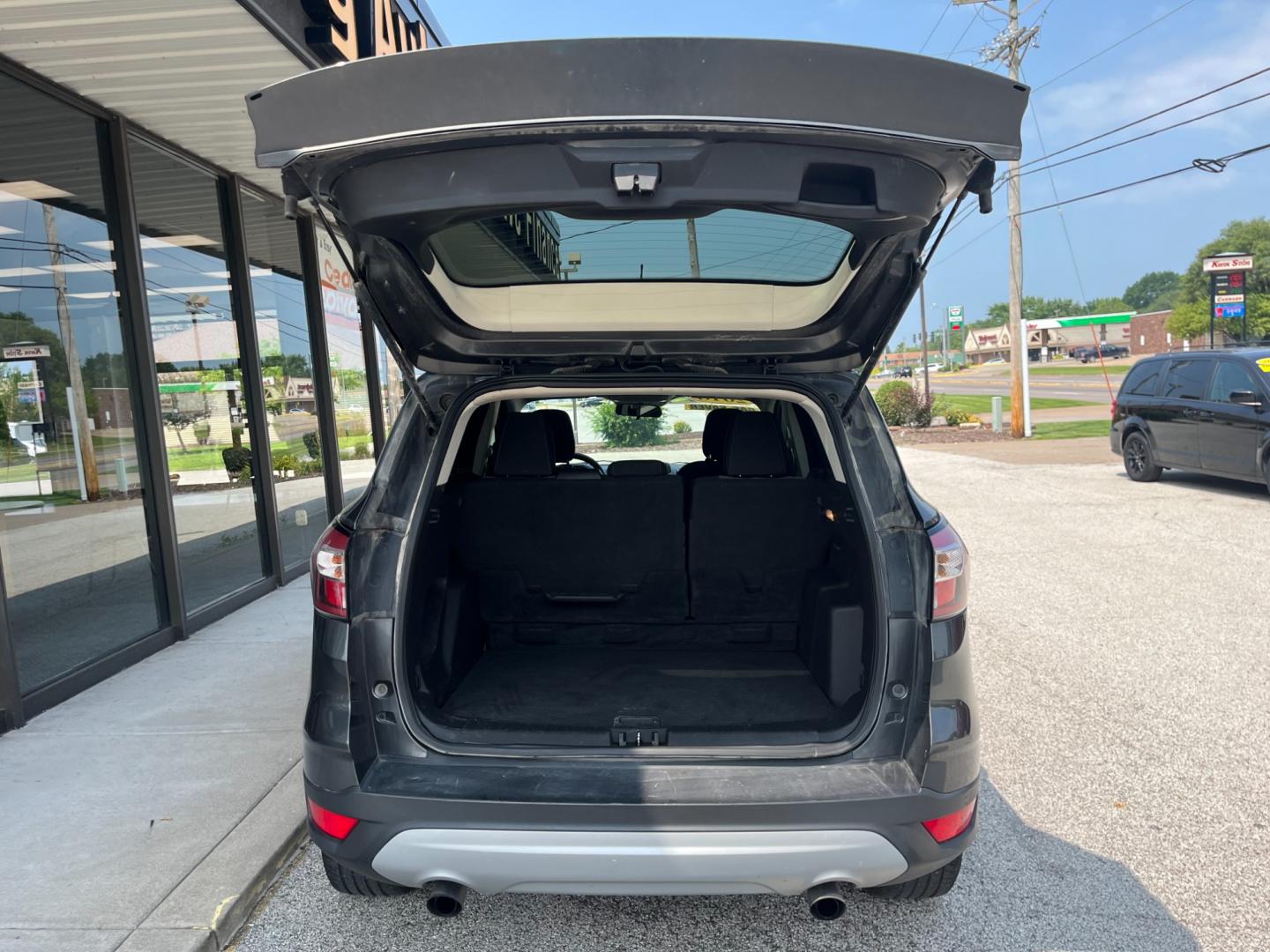 2018 Magnetic Metallic Ford Escape SE FWD (1FMCU0GD3JU) with an 1.5L L4 DOHC 16V engine, 6-Speed Automatic transmission, located at 1633 W Kimberly, Davenport, IA, 52806, (563) 323-5341, 41.559456, -90.598732 - Photo#5