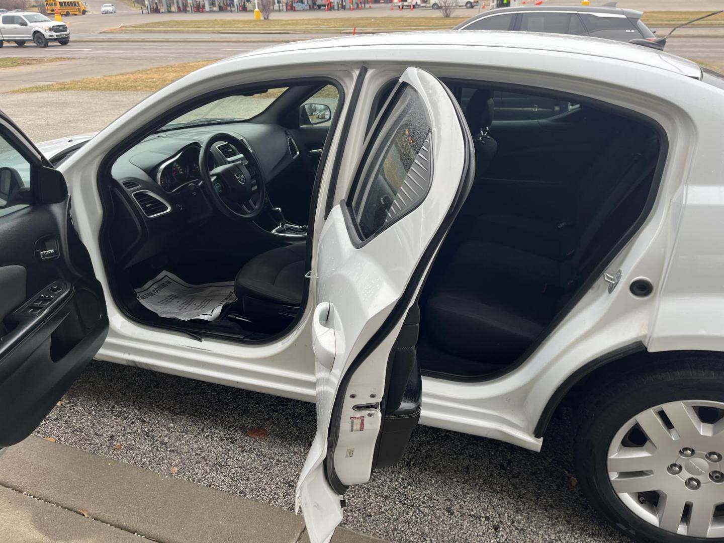 2014 Bright White Clearco Dodge Avenger SE (1C3CDZAB6EN) with an 2.4L L4 DOHC 16V engine, 4-Speed Automatic transmission, located at 1633 W Kimberly, Davenport, IA, 52806, (563) 323-5341, 41.559456, -90.598732 - Photo#7