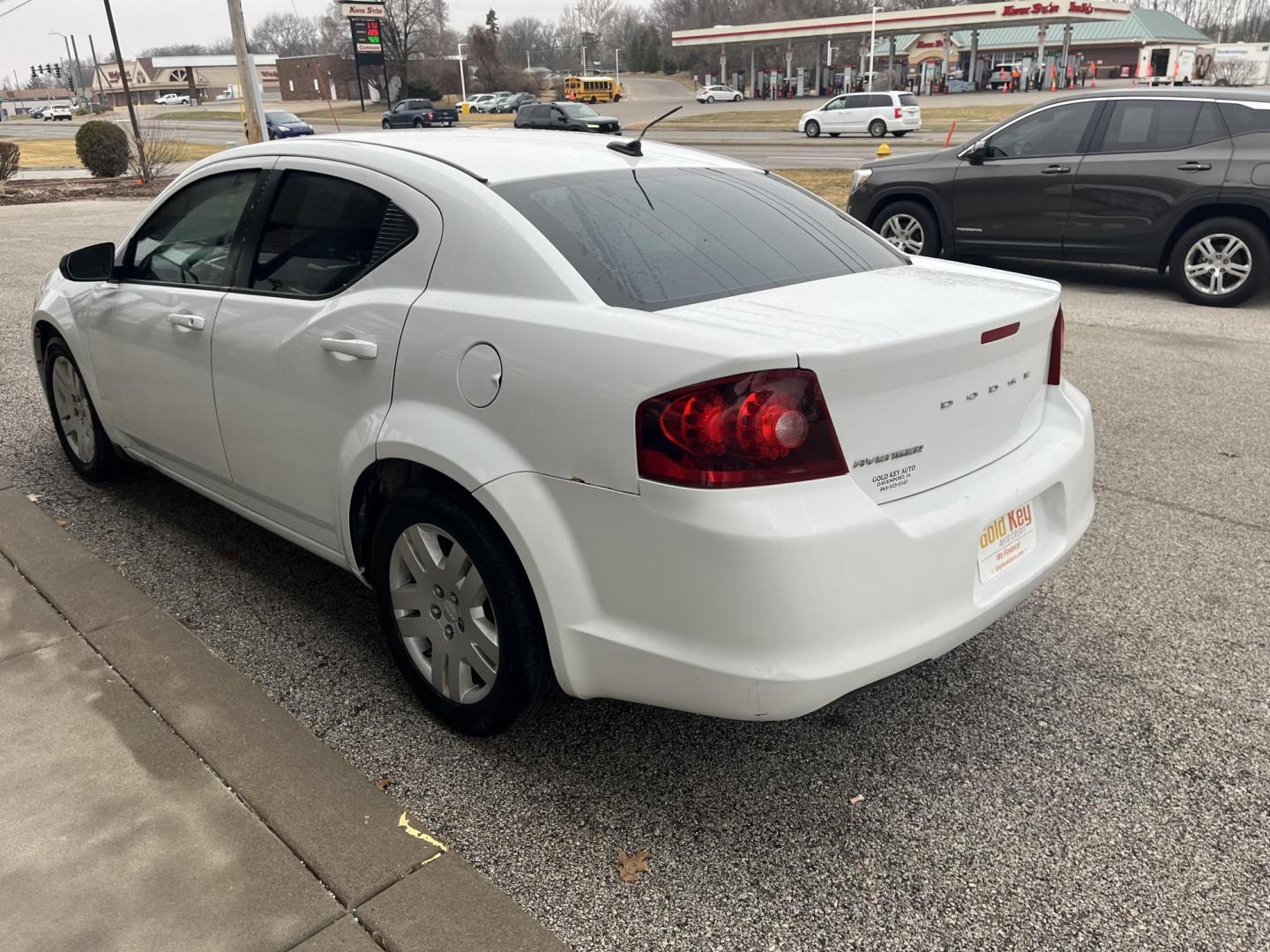 2014 Bright White Clearco Dodge Avenger SE (1C3CDZAB6EN) with an 2.4L L4 DOHC 16V engine, 4-Speed Automatic transmission, located at 1633 W Kimberly, Davenport, IA, 52806, (563) 323-5341, 41.559456, -90.598732 - Photo#3