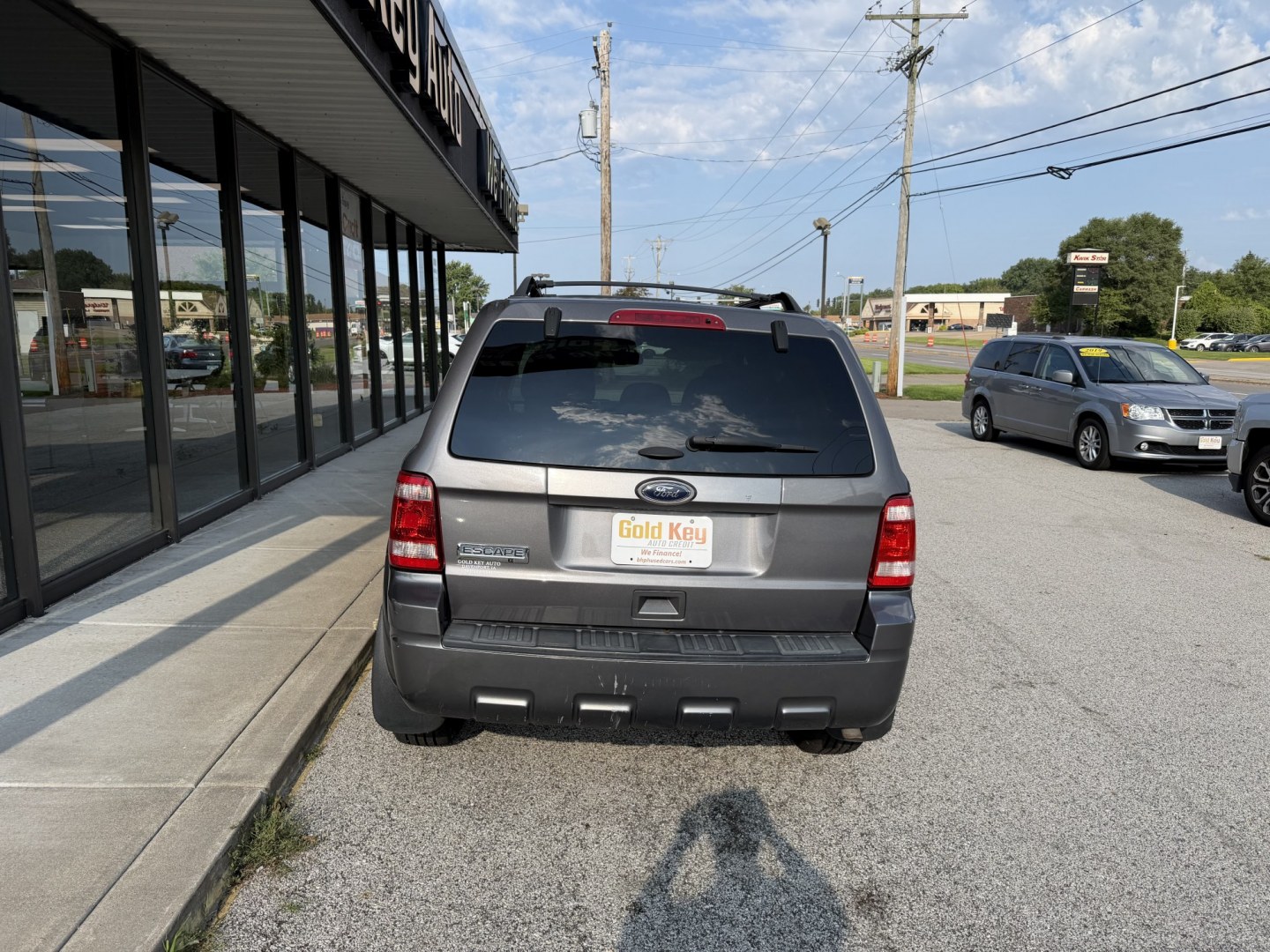 2012 Sterling Grey Metallic Ford Escape XLT FWD (1FMCU0D73CK) with an 2.5L L4 DOHC 16V engine, 6-Speed Automatic transmission, located at 1633 W Kimberly, Davenport, IA, 52806, (563) 323-5341, 41.559456, -90.598732- Photo#2