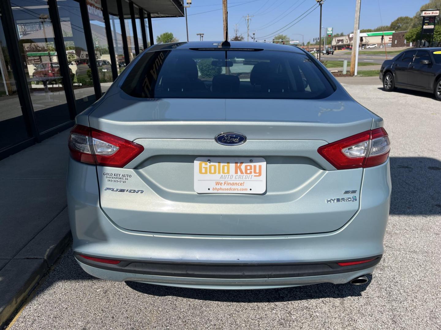 2013 Ginger Ale Ford Fusion Hybrid SE (3FA6P0LU8DR) with an 2.0L L4 DOHC 16V HYB engine, CVT transmission, located at 1633 W Kimberly, Davenport, IA, 52806, (563) 323-5341, 41.559456, -90.598732 - Photo#4