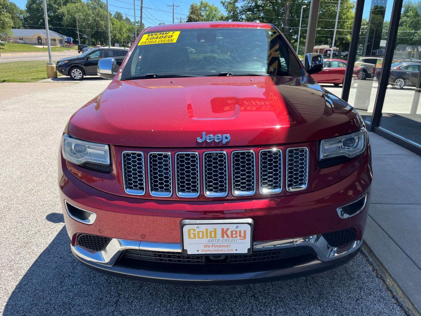 2014 Dp Cherry Red Crystal PC Jeep Grand Cherokee Summit 4WD (1C4RJFJGXEC) with an 3.6L V6 DOHC 24V engine, 5-Speed Automatic transmission, located at 1633 W Kimberly, Davenport, IA, 52806, (563) 323-5341, 41.559456, -90.598732 - Photo#1