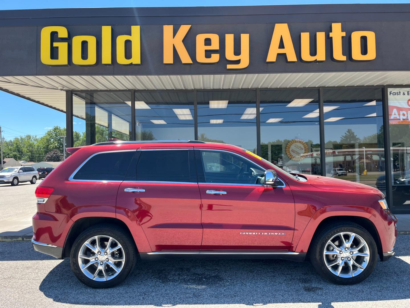 2014 Dp Cherry Red Crystal PC Jeep Grand Cherokee Summit 4WD (1C4RJFJGXEC) with an 3.6L V6 DOHC 24V engine, 5-Speed Automatic transmission, located at 1633 W Kimberly, Davenport, IA, 52806, (563) 323-5341, 41.559456, -90.598732 - Photo#0