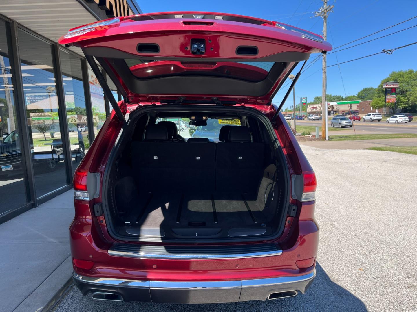 2014 Dp Cherry Red Crystal PC Jeep Grand Cherokee Summit 4WD (1C4RJFJGXEC) with an 3.6L V6 DOHC 24V engine, 5-Speed Automatic transmission, located at 1633 W Kimberly, Davenport, IA, 52806, (563) 323-5341, 41.559456, -90.598732 - Photo#5
